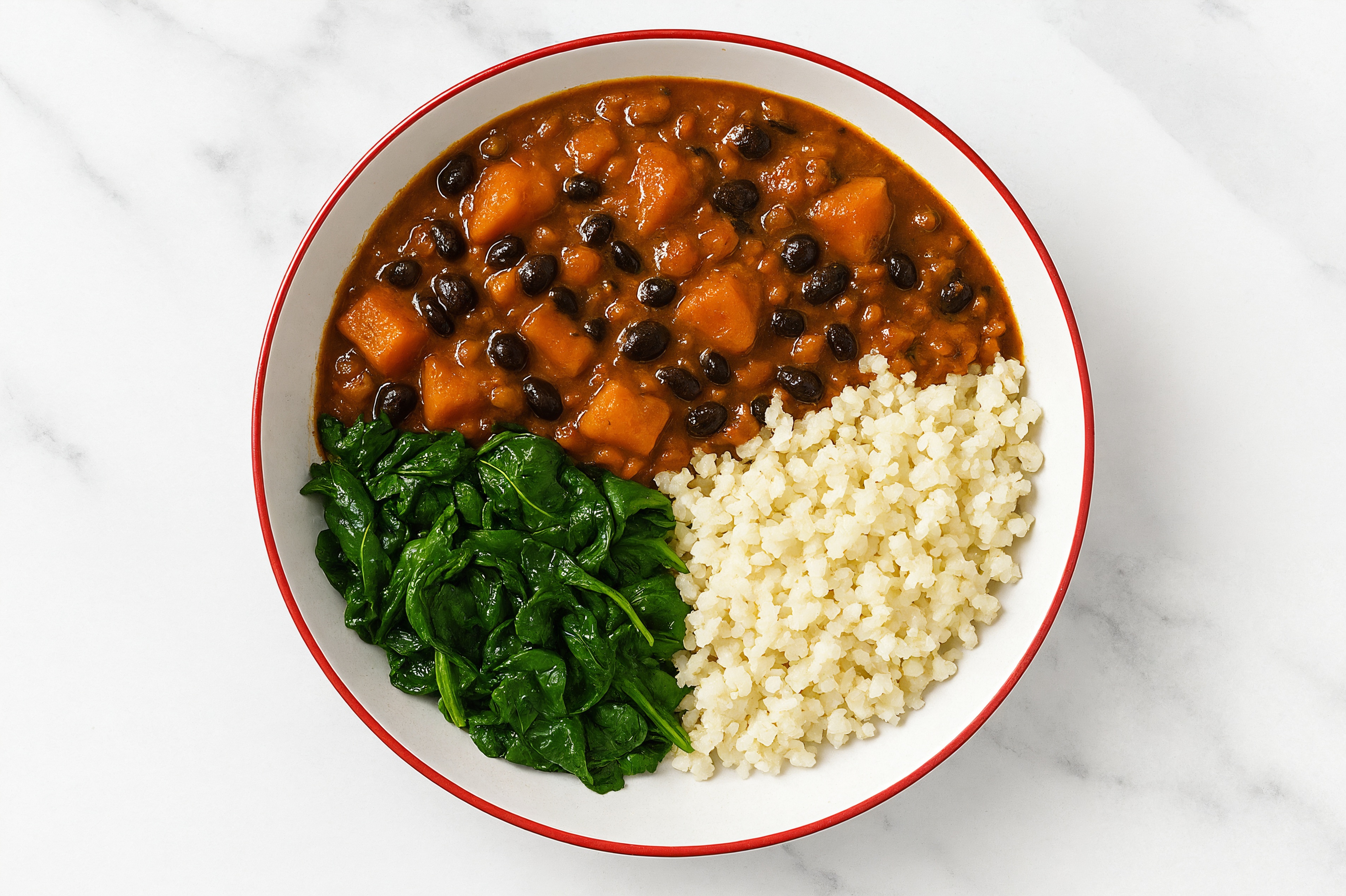 Japanese Sweet Potato Black Bean Vindaloo with Spinach + Cauliflower Rice