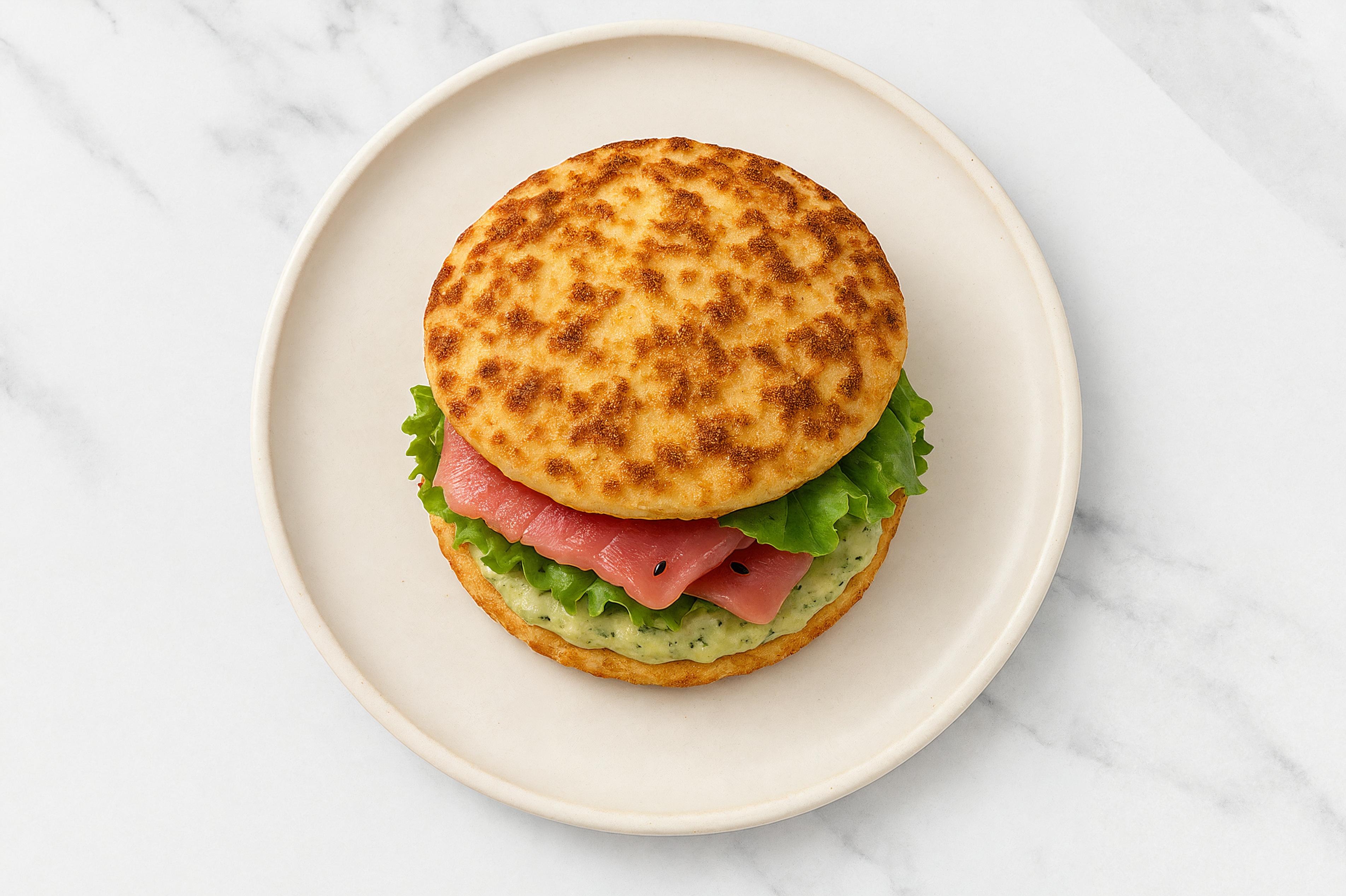 Creamy Artichoke Smoked Tuna Sandwich with Green Leaf Lettuce on Cauliflower Rounds