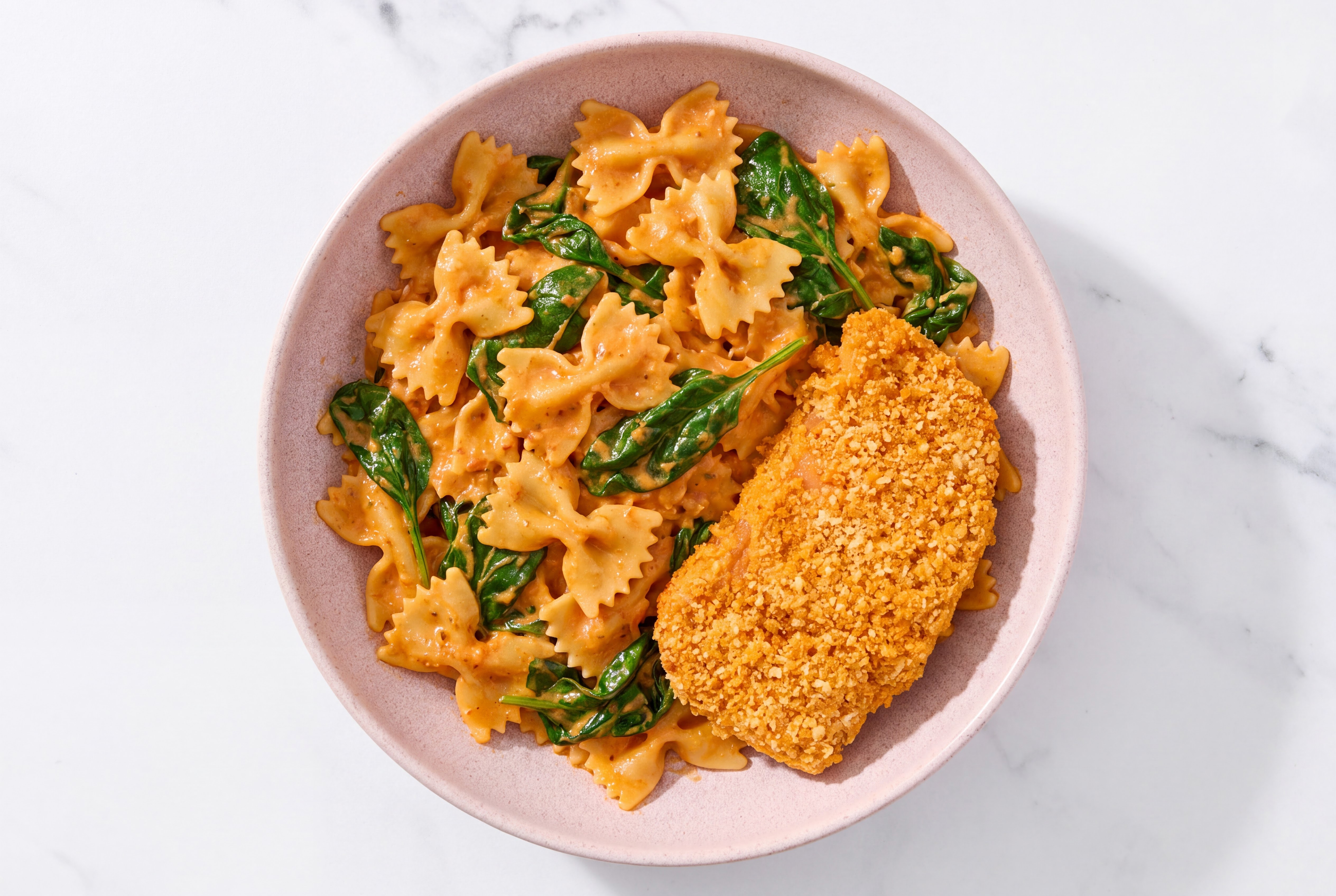 Crispy Hot Honey Chicken over Creamy Vodka Farfalle with Baby Spinach