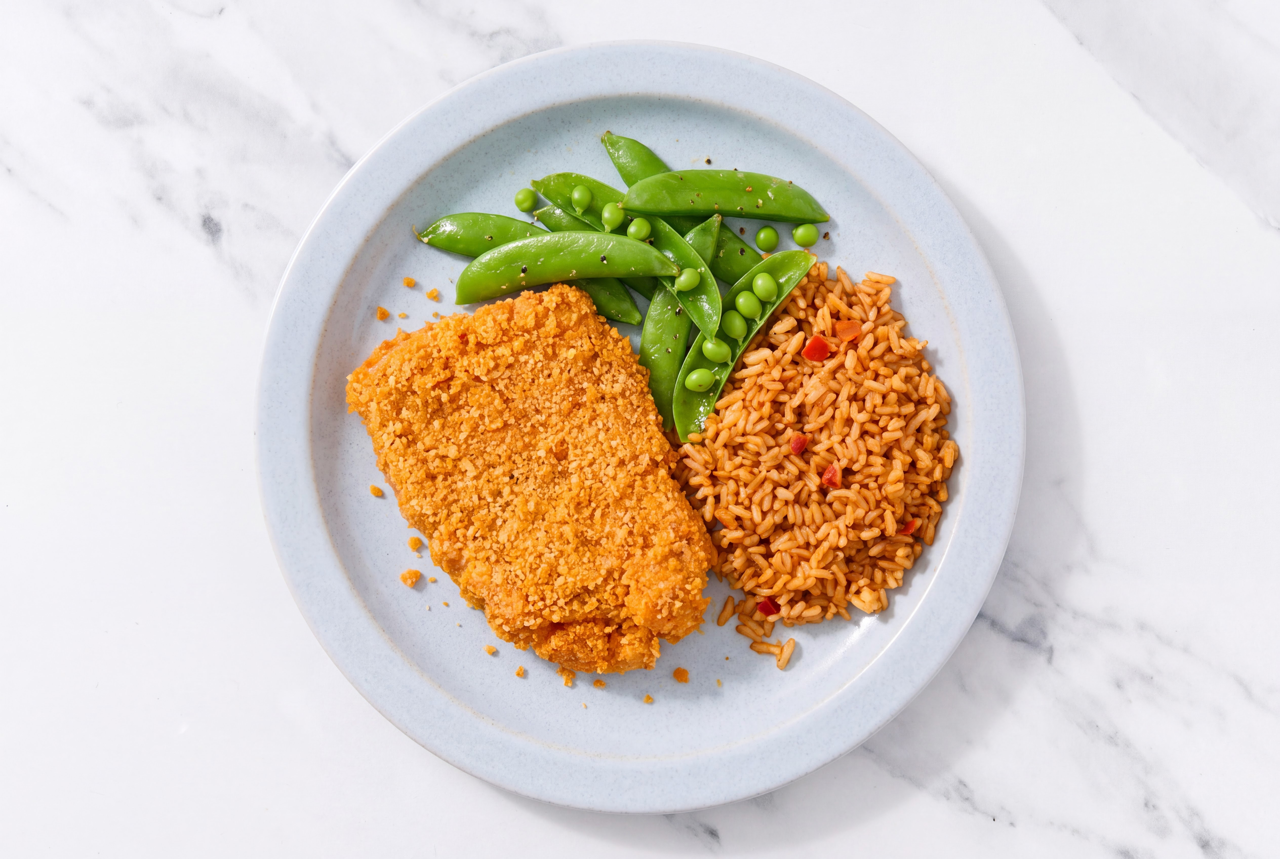 Hot Honey Breaded Chicken Cutlet with Snap Peas & Mexican Rice