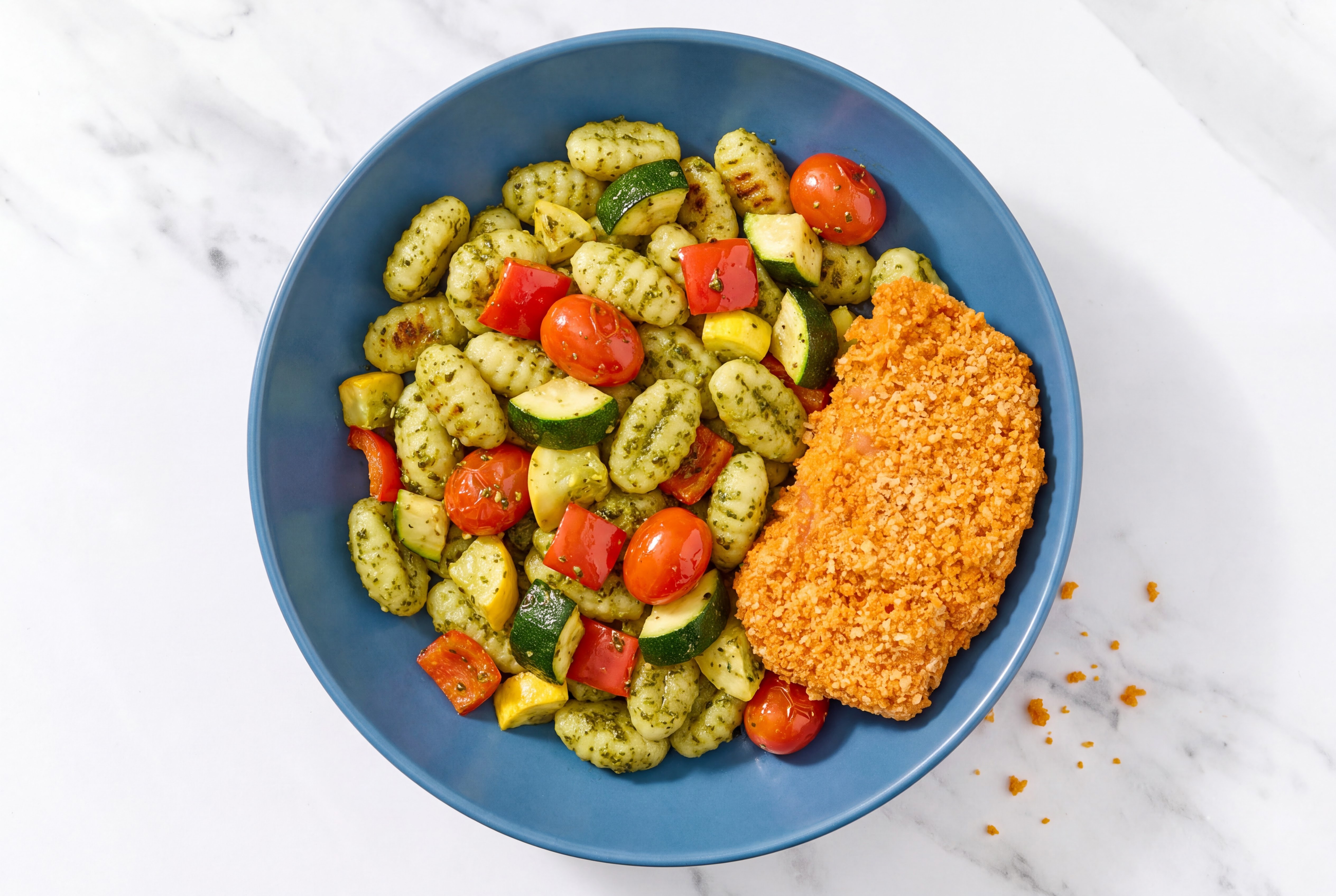 Crispy Hot Honey Chicken over Pesto Gnocchi with Mixed Veggies