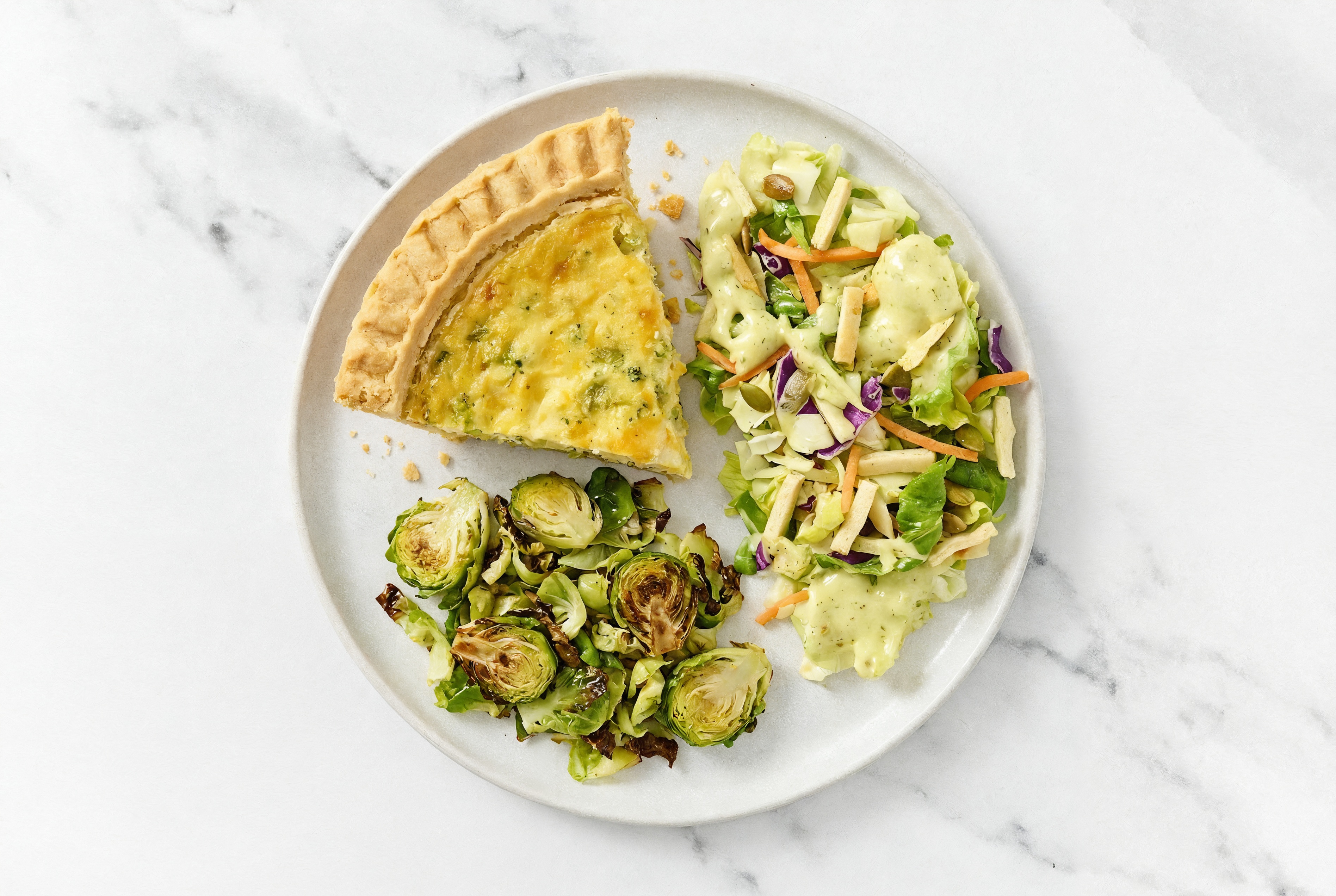 Broccoli & Cheddar Quiche with Brussels & Goddess Salad
