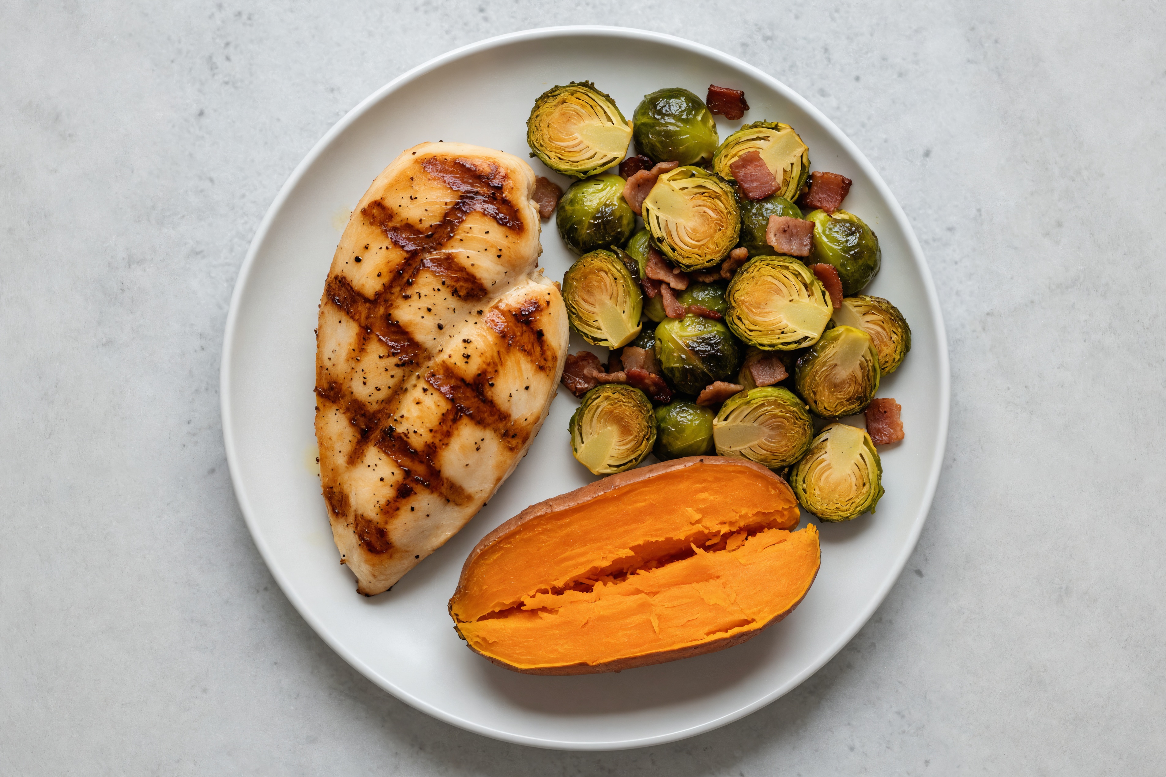 Grilled Seasoned Chicken Breast with Bacony Brussels