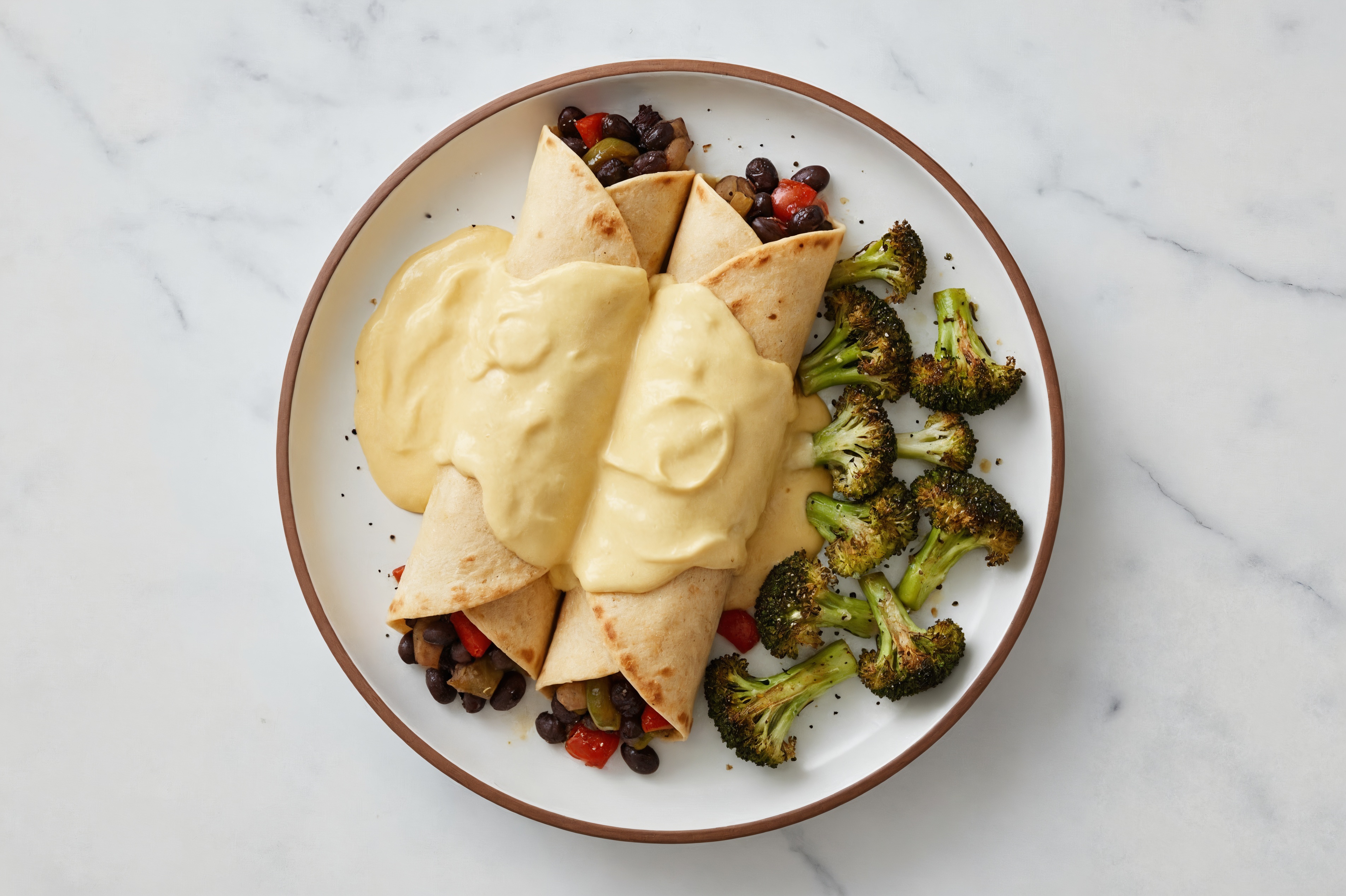Cuban Spiced Black Beans Bean + Veggie Enchiladas with Cashew Queso