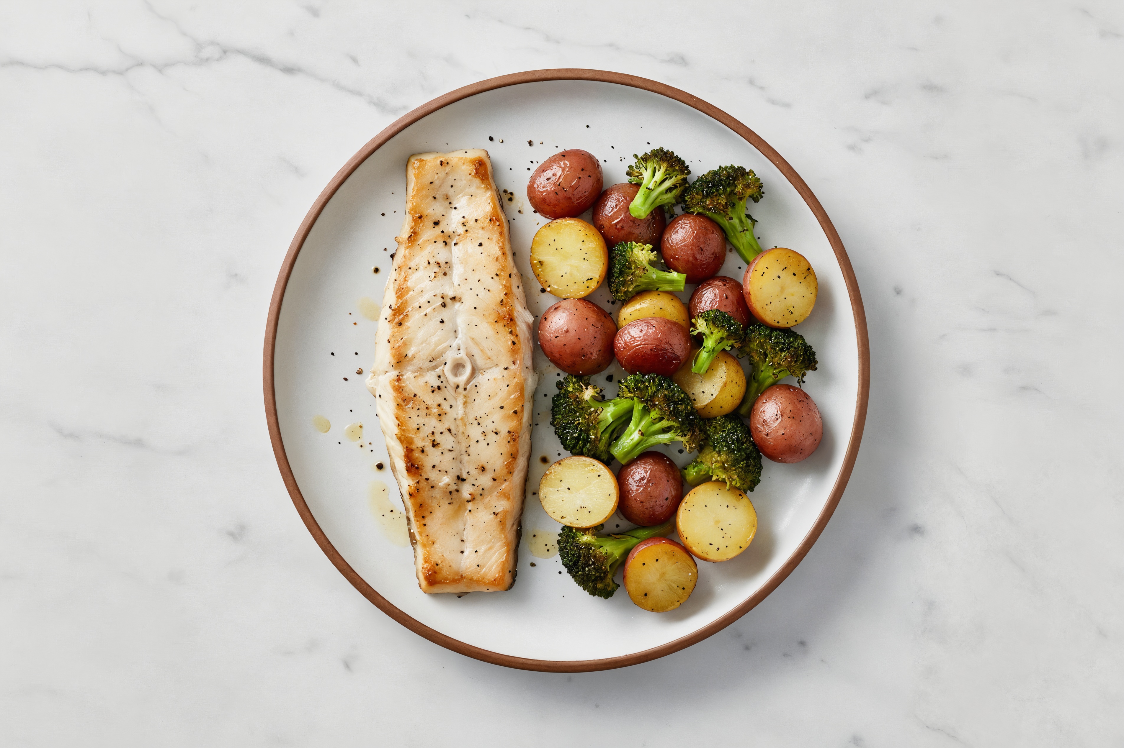 Spiced Oven Roasted Steelhead Trout with Baby Potatoes with Broccoli Florets