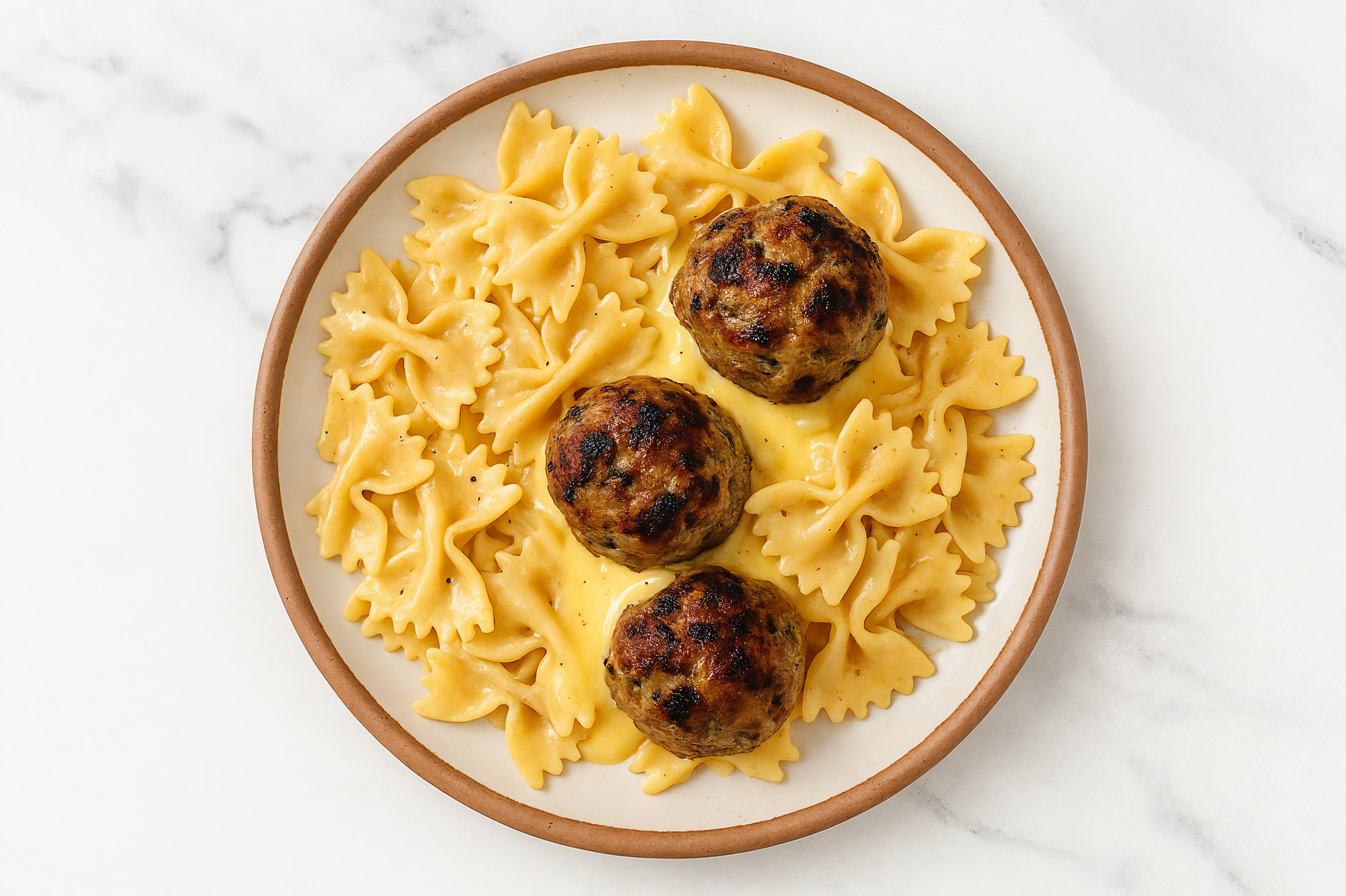 Creamy Cheddar Bowtie Pasta with Meatballs