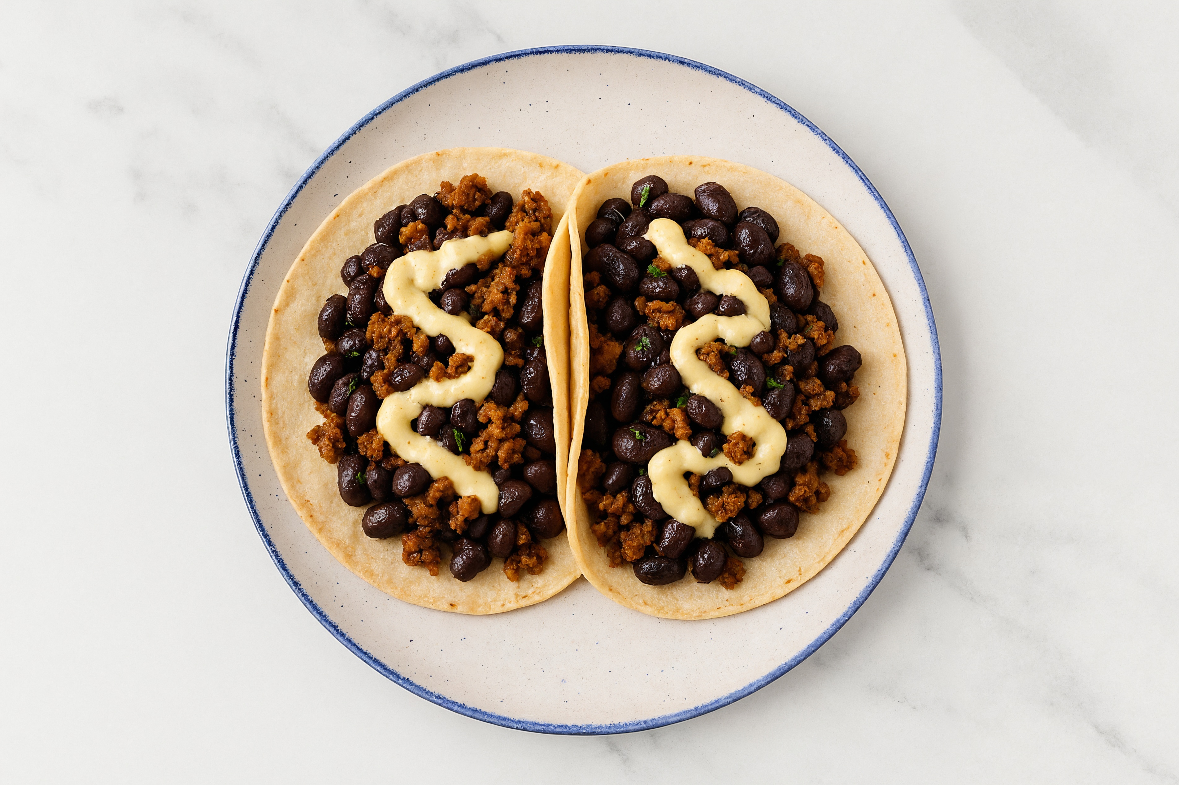 Cuban Spiced Black Beans Bean Tacos with "Chorizo" & Garlic Sauce