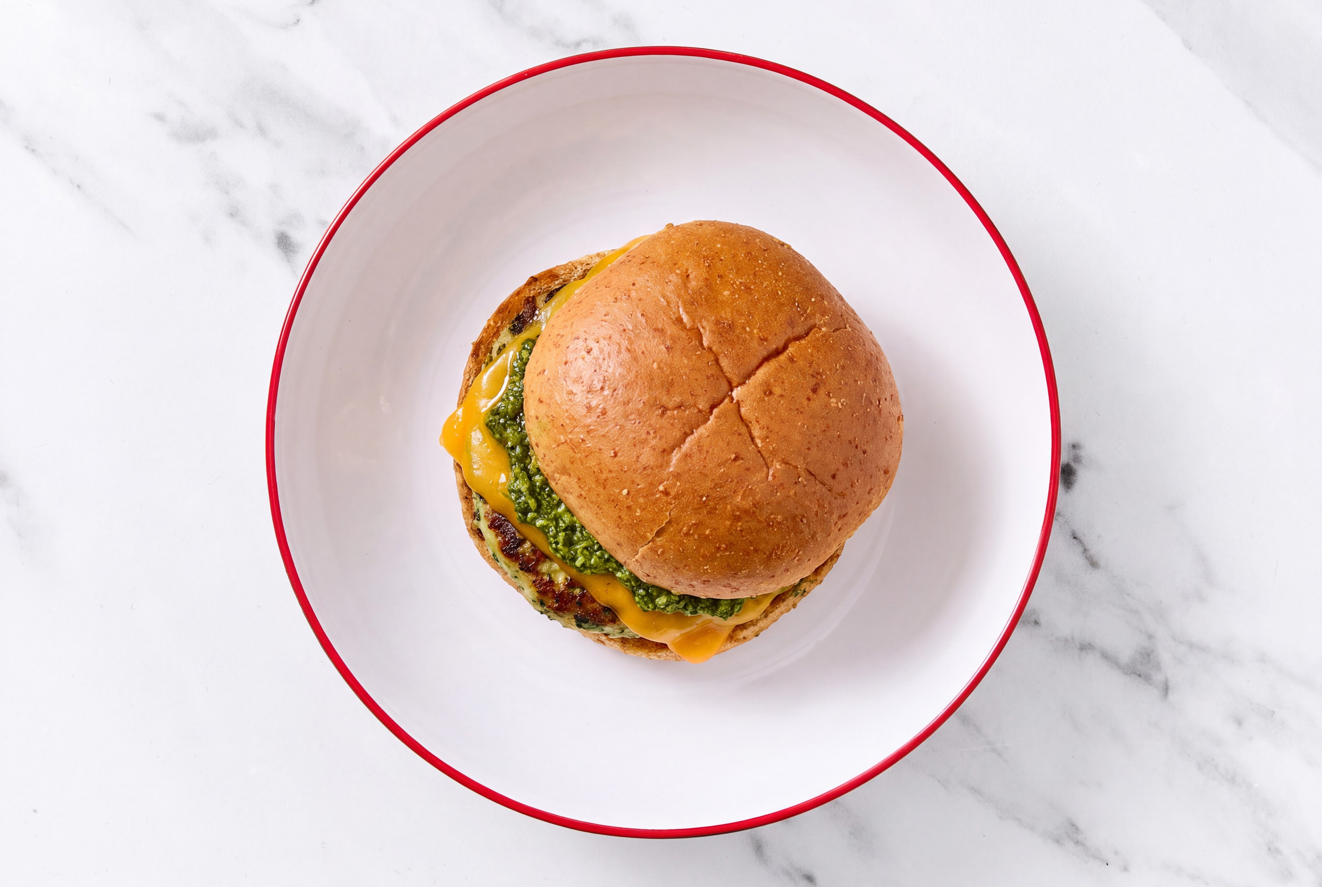 Garlic Turkey Burger on Sprouted Grain with Spinach Pesto & Cheddar