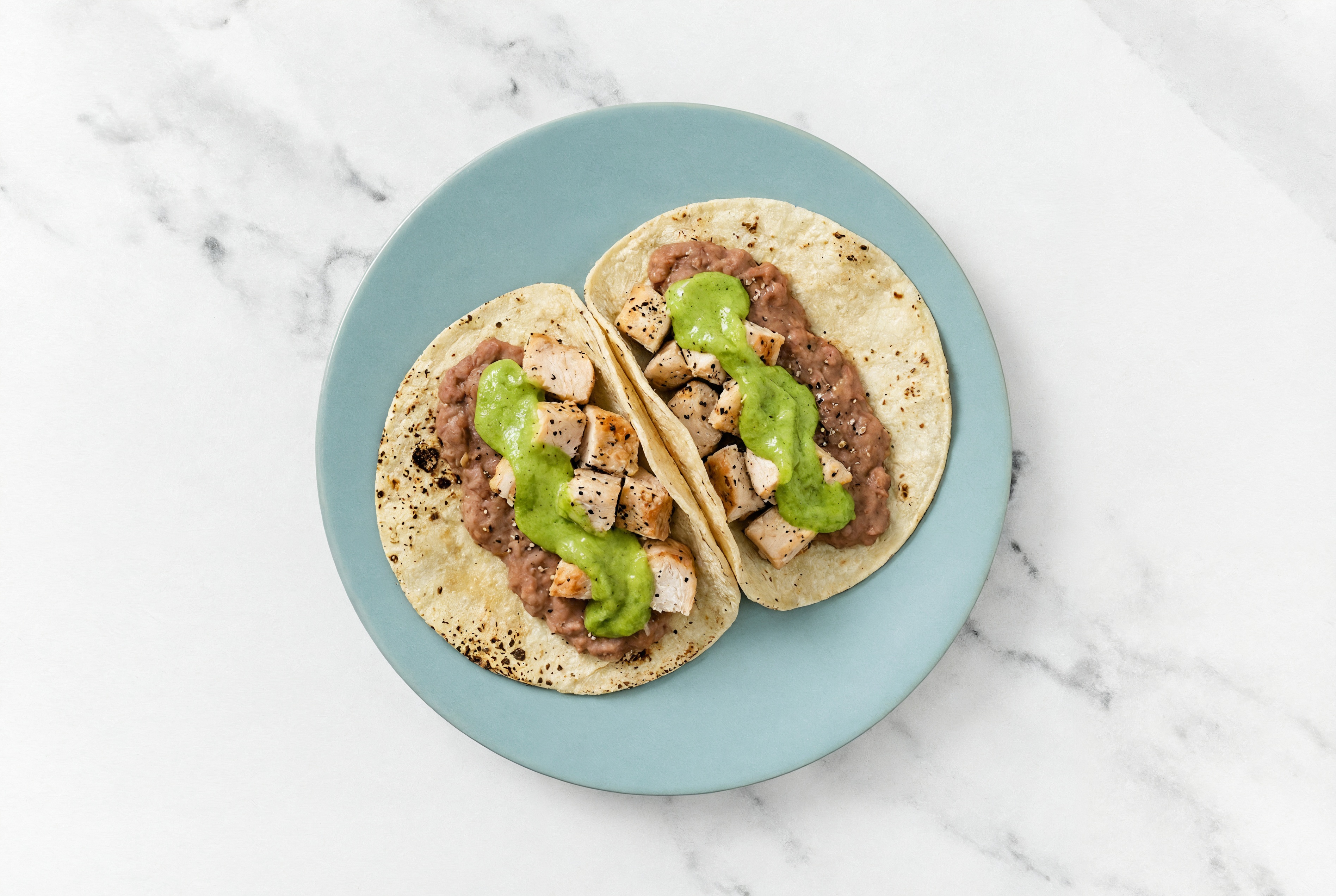 Hearty Garlic Turkey Tacos with Avocado & Refried Red Beans