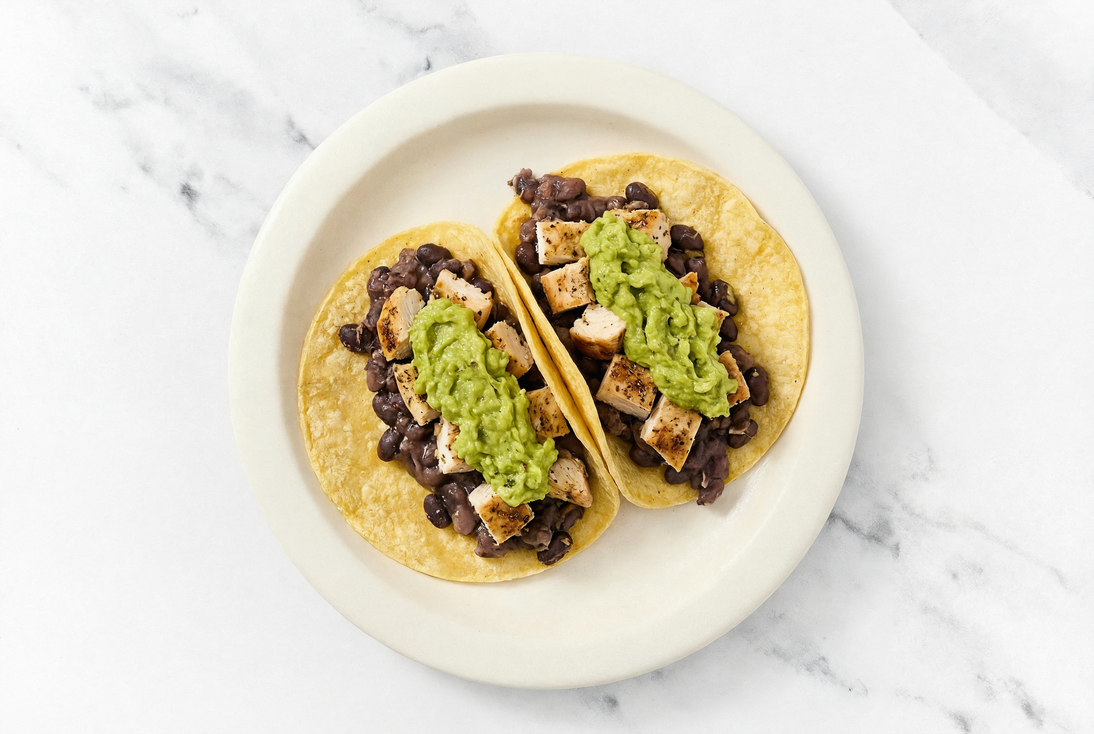 Herby Garlic Chicken Tacos with Guacamole & Spiced Beans