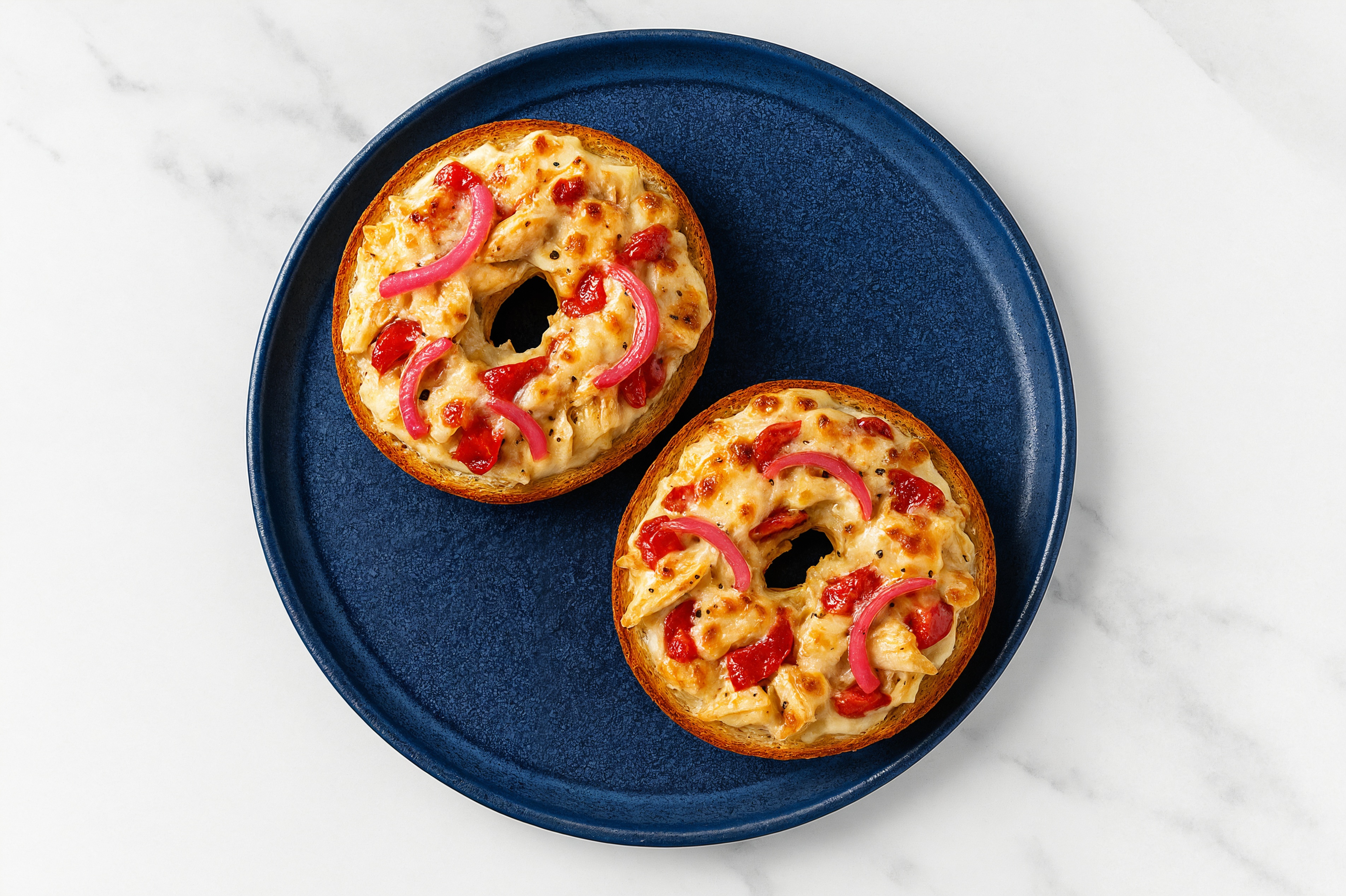Cheesy Pulled Chicken + Roasted Bell Pepper Pizza Gluten-Free Plain Bagels with Pickled Onion