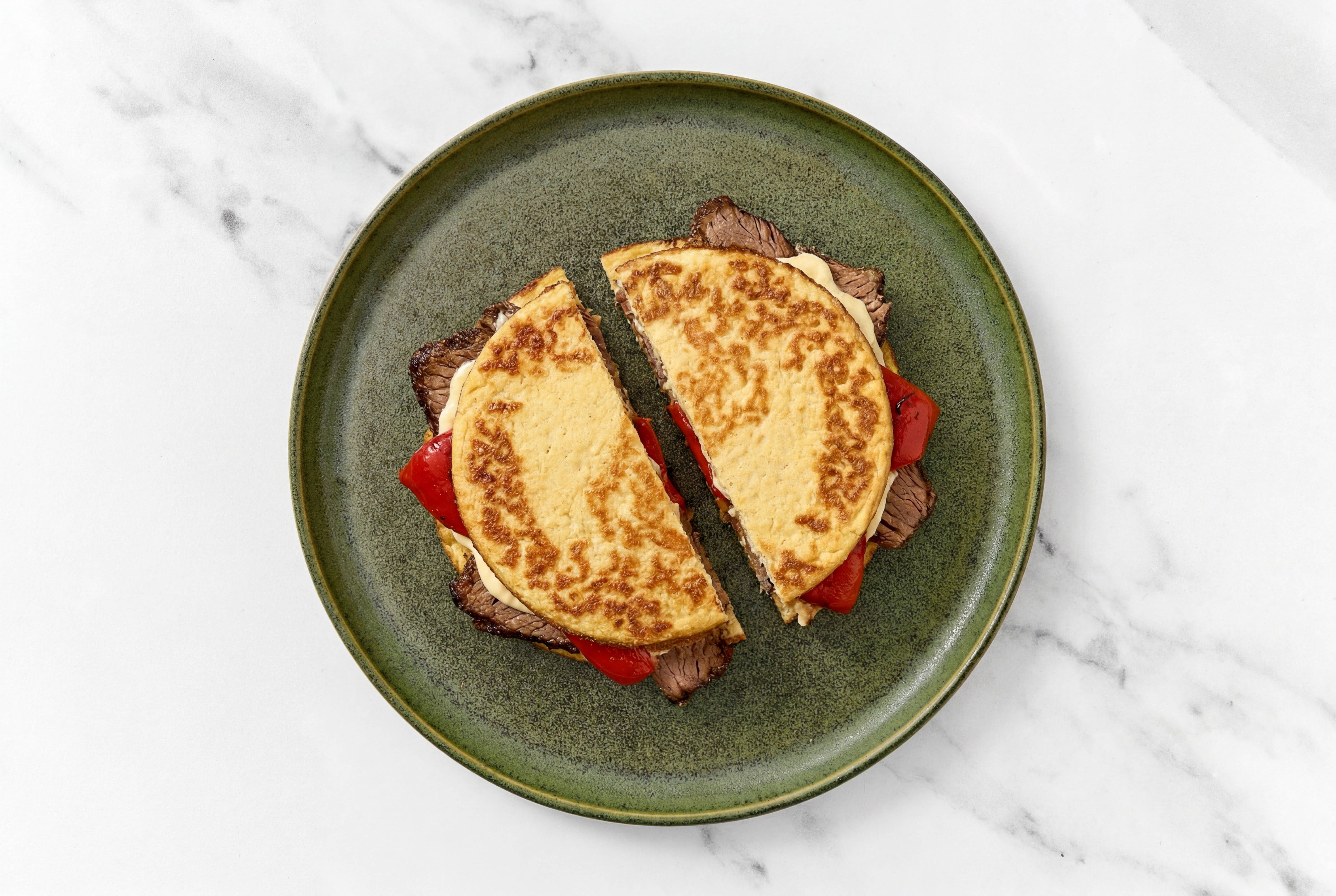 Creamy Horseradish Beef Short Rib Sandwich with Roasted Peppers on Cauliflower Rounds
