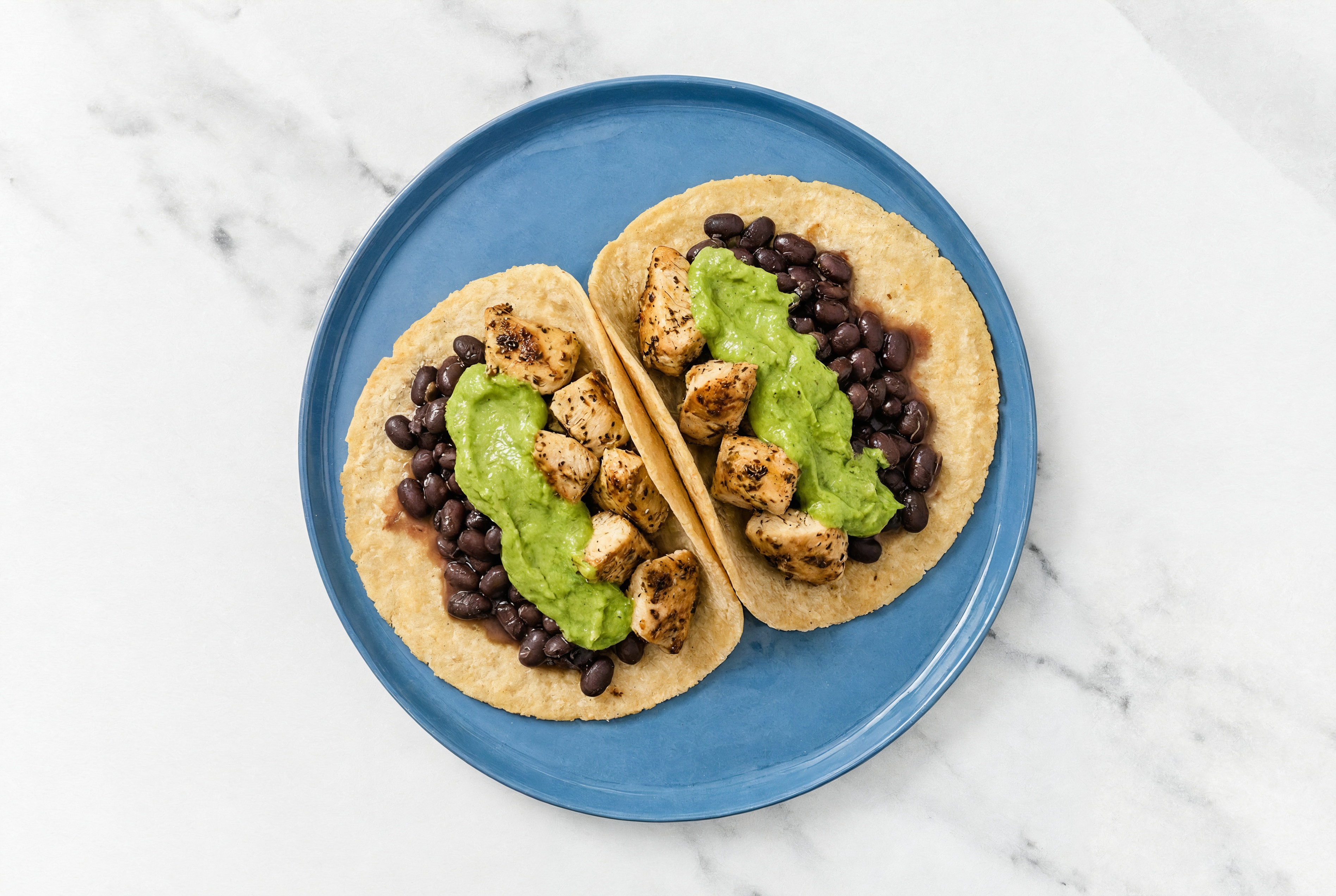 Garlic Chicken Tacos with Avocado & Spiced Beans