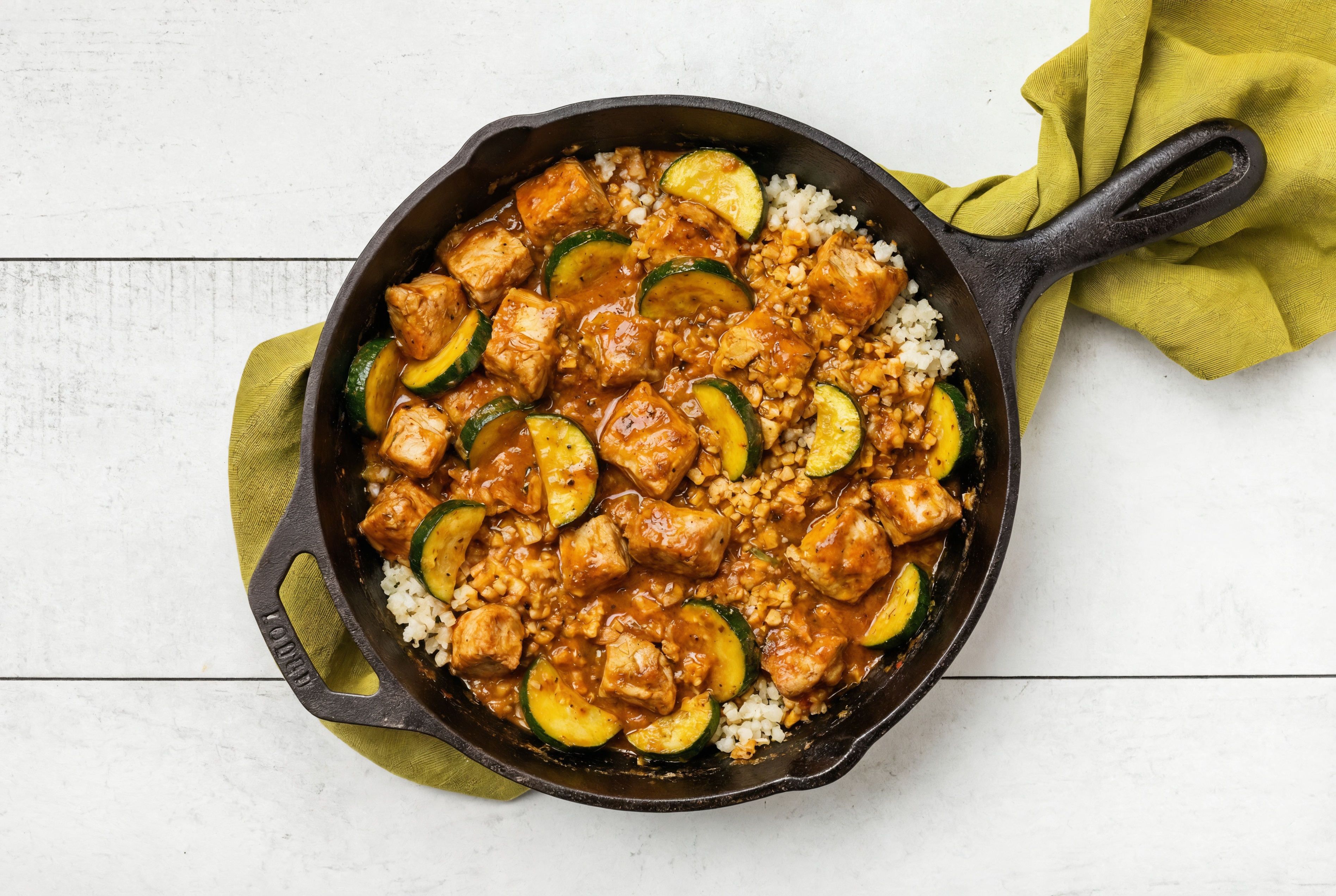 Tikka Masala Pork Chop Stir-Fry with Zucchini over Riced Cauliflower