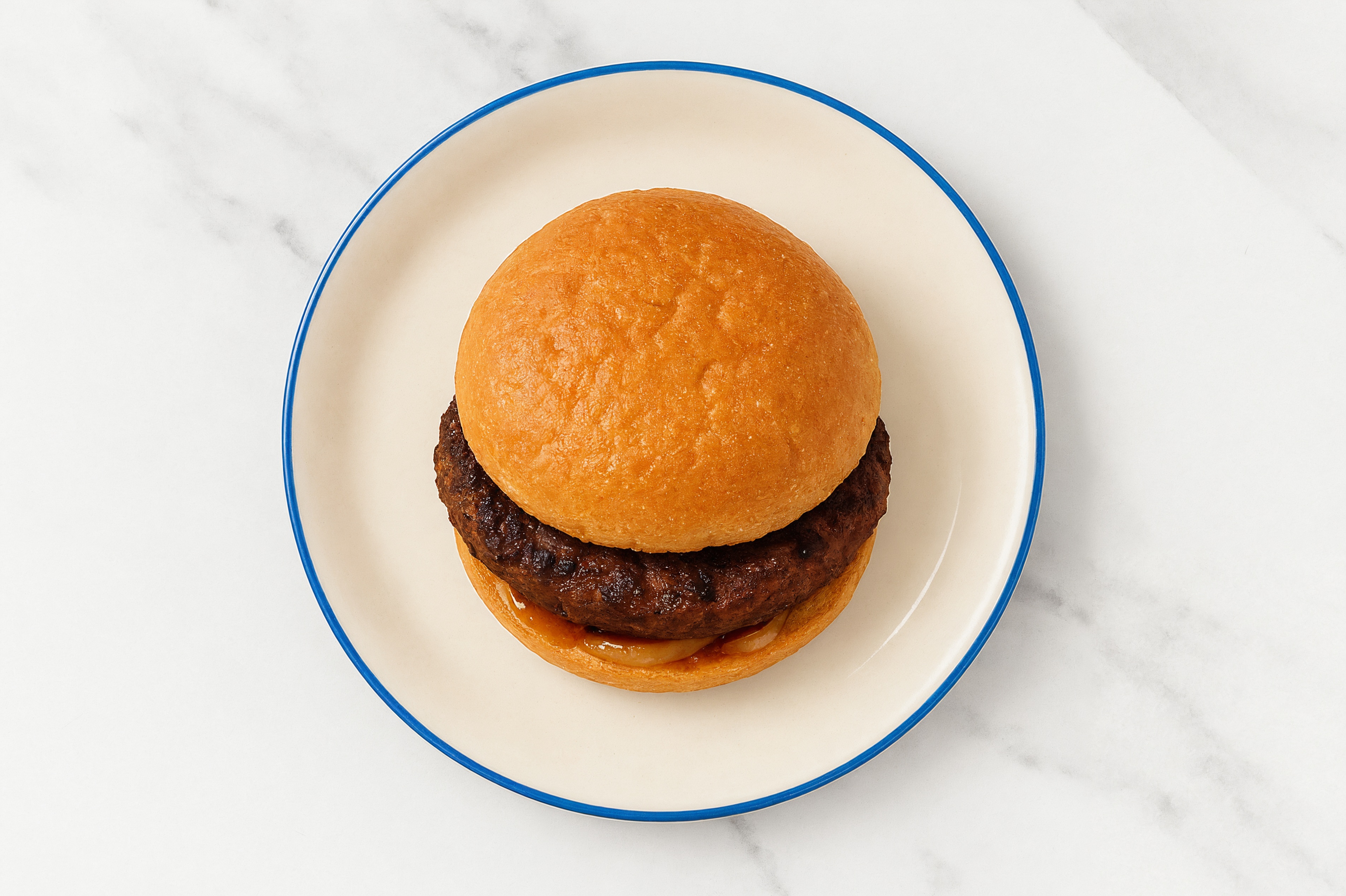 Caramelized Onion Beyond Burger on GF Bun with Smoky BBQ Sauce