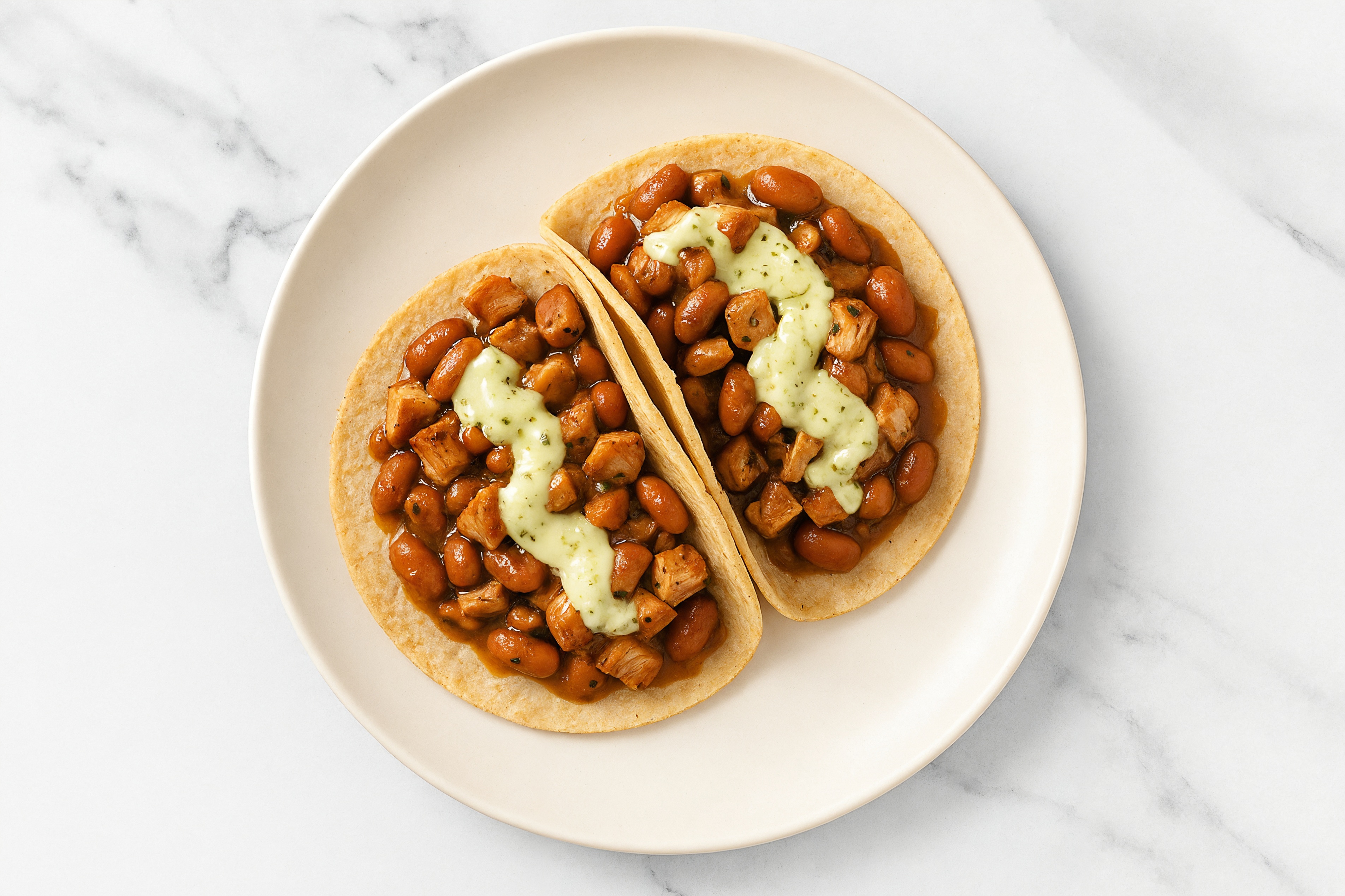 Chipotle Turkey Tacos with Jalapeño Crema & Pinto Beans