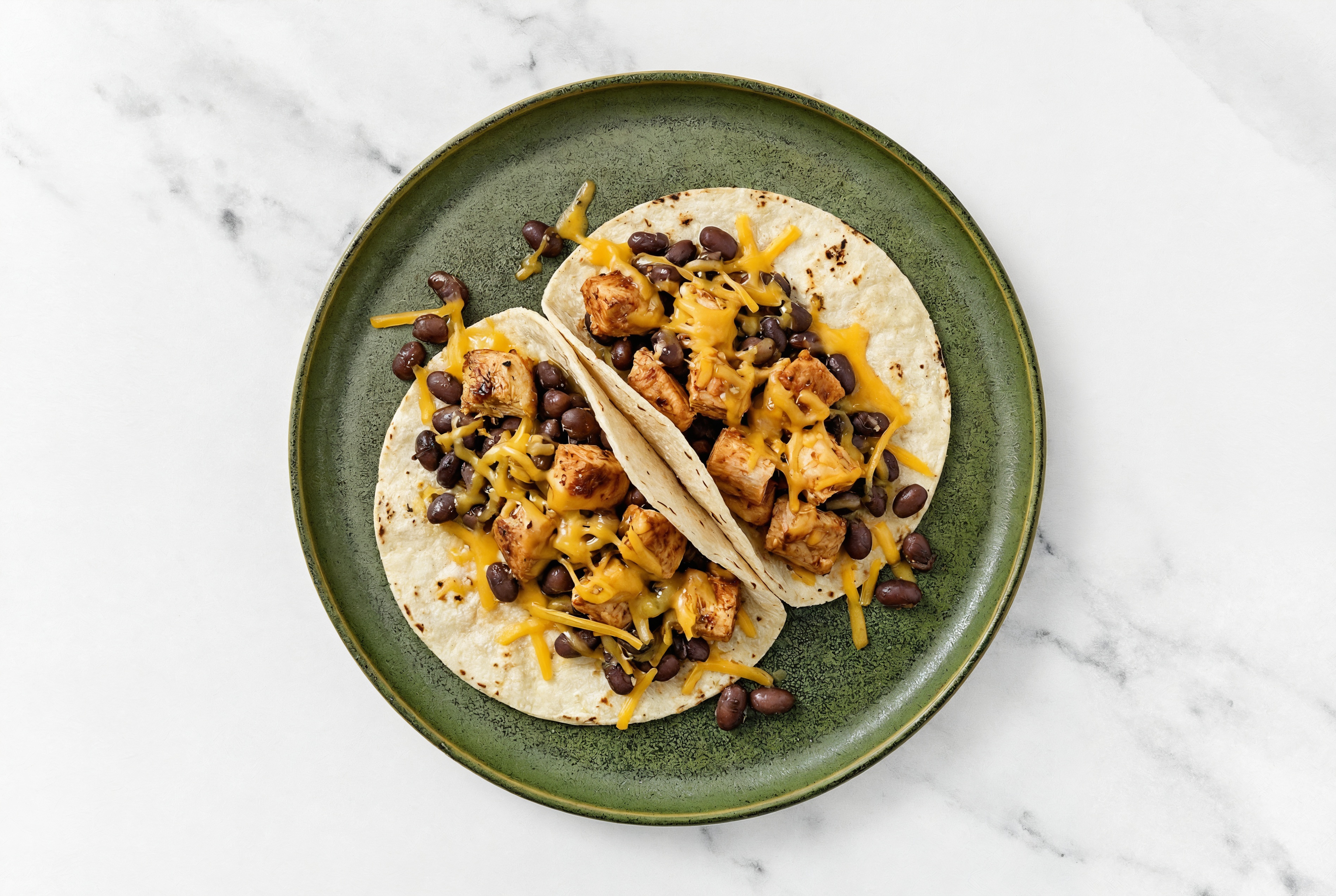 Hearty Chipotle Chicken Tacos with Cheddar Cheese & Spiced Beans