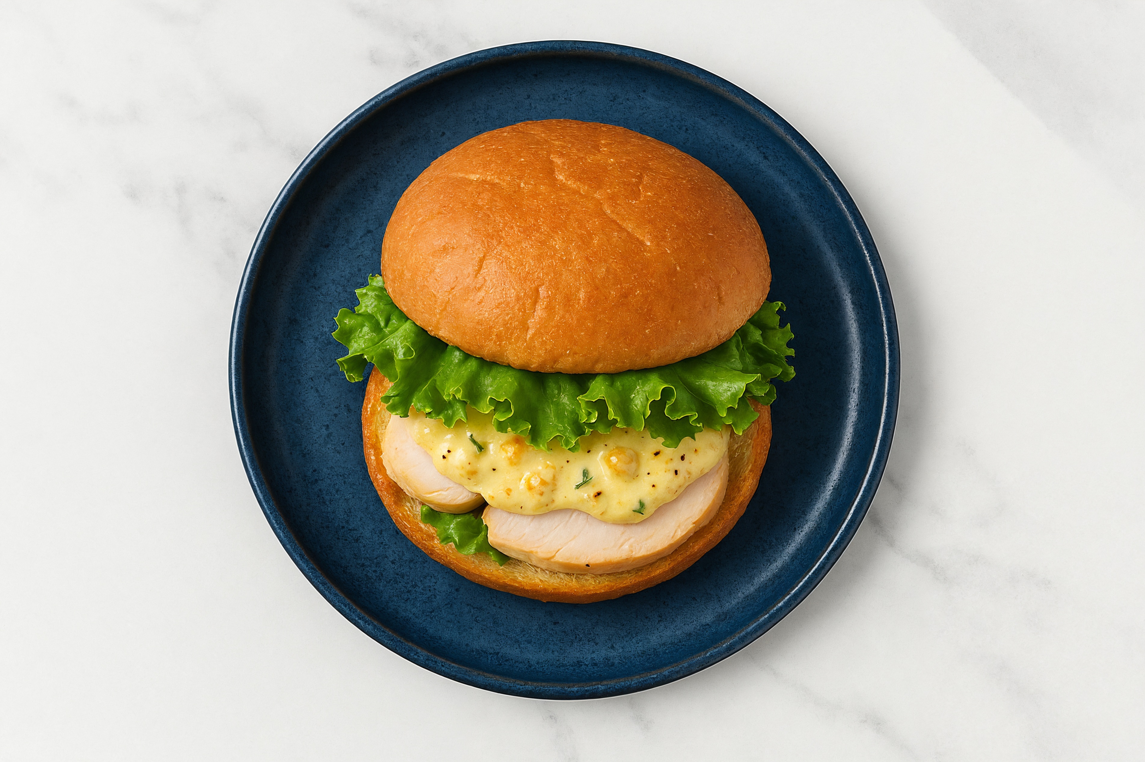 Street Corn Roasted Chicken Sandwich with Green Leaf Lettuce on Gluten-Free Buns