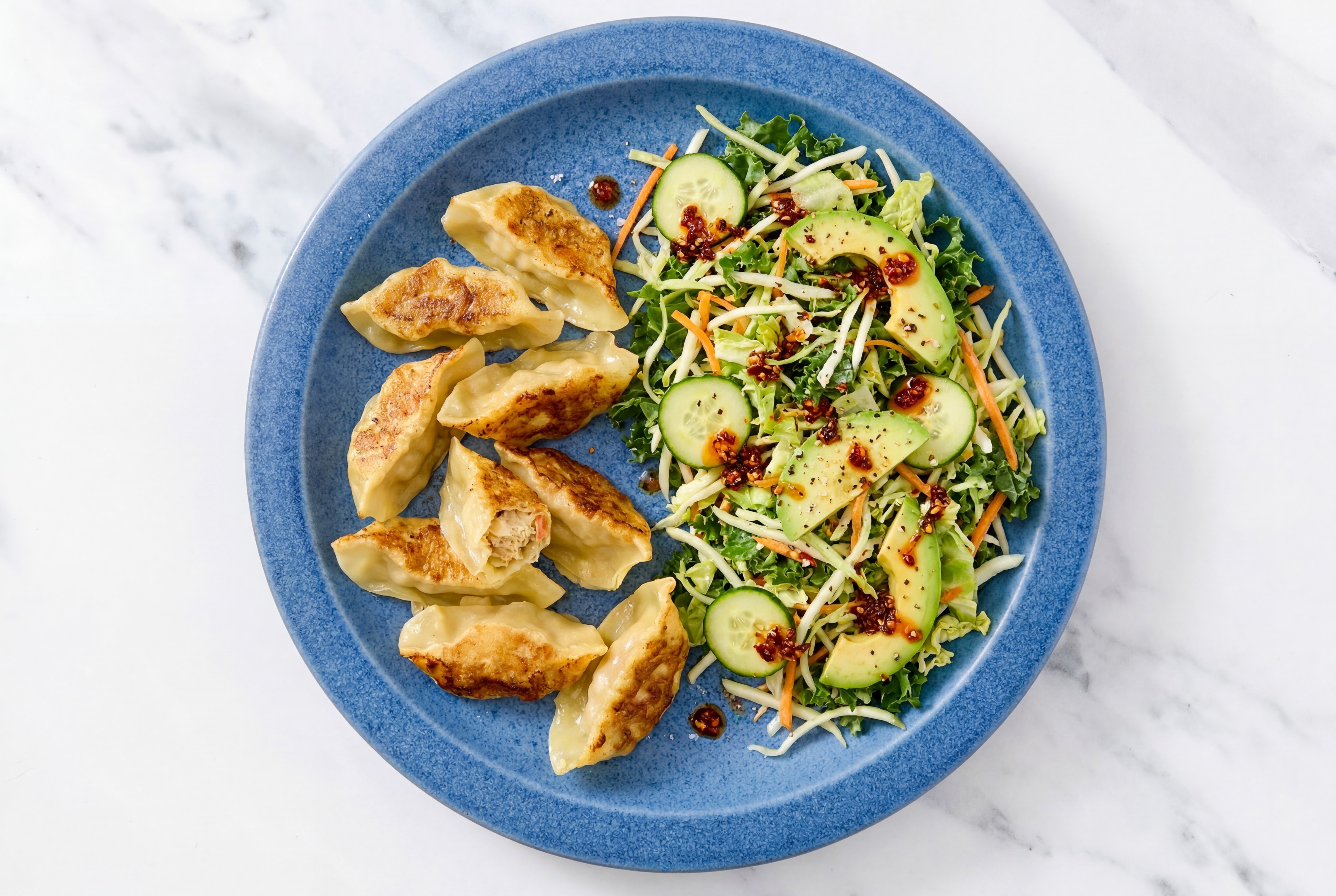 Fried Chicken Ginger Dumplings + Chili Sesame Veggie Slaw