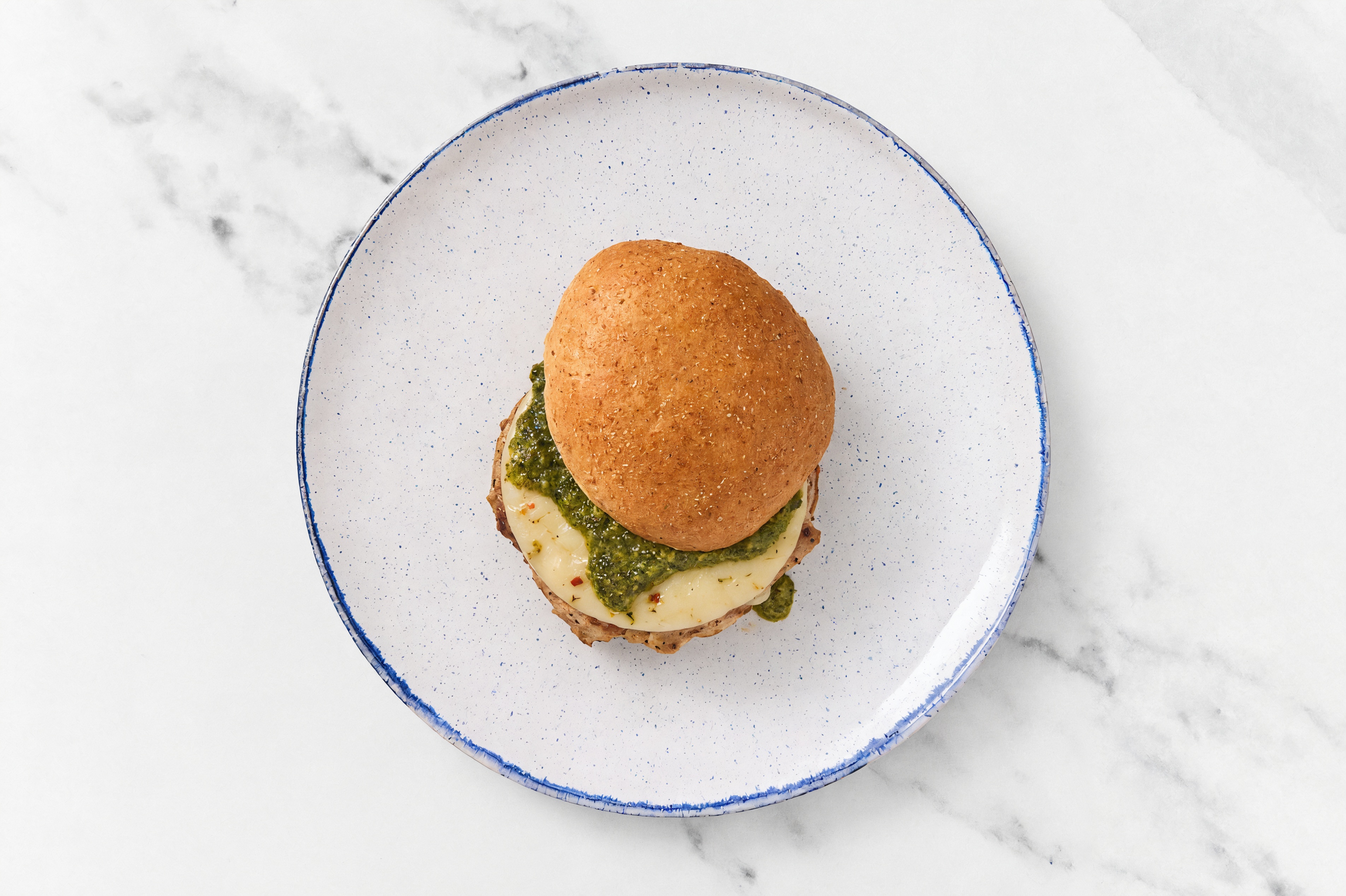 Garlic Turkey Burger on Sprouted Grain with Spinach Pesto & Pepper Jack