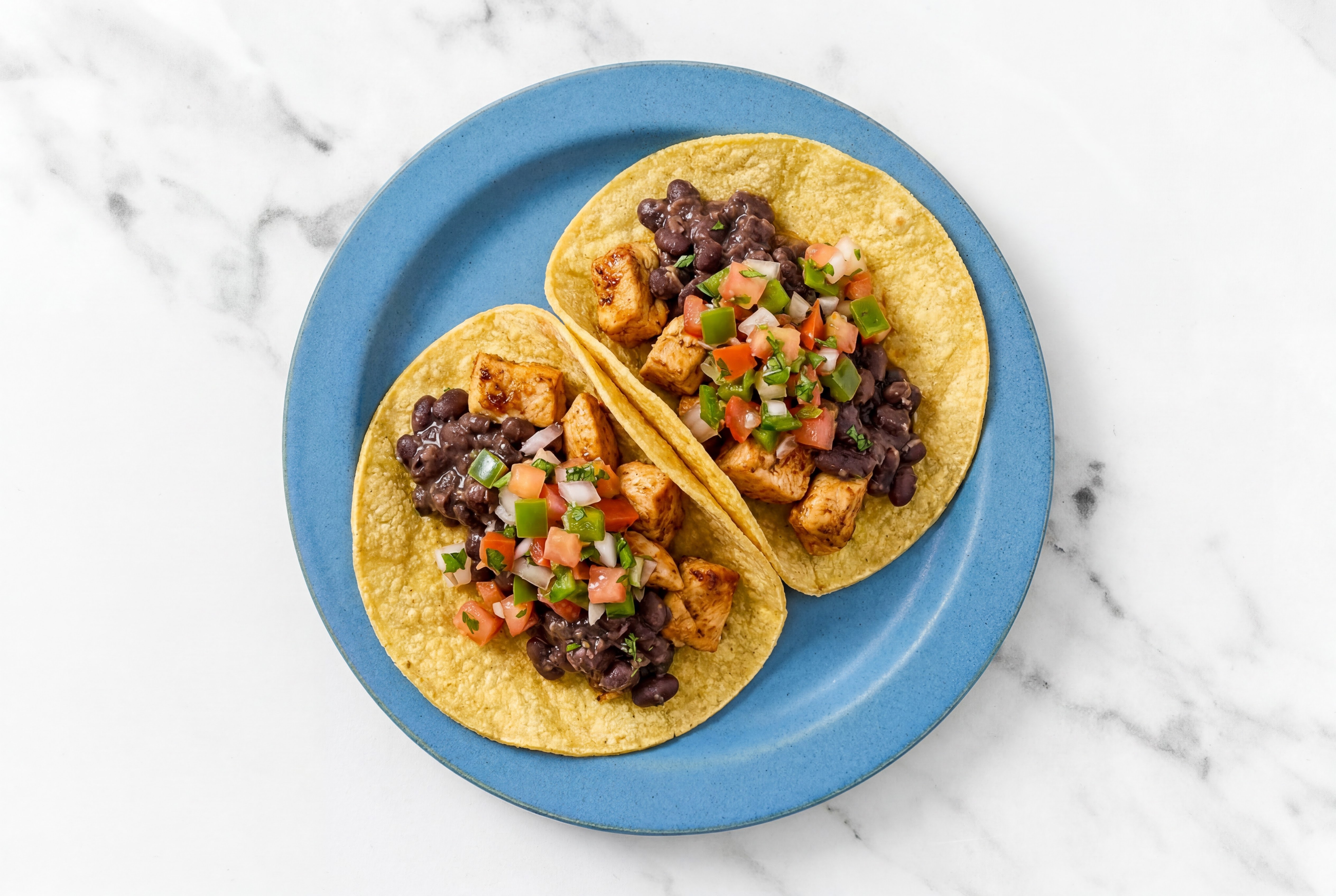 Herby Chipotle Chicken Tacos with Fresh Salsa & Spiced Beans