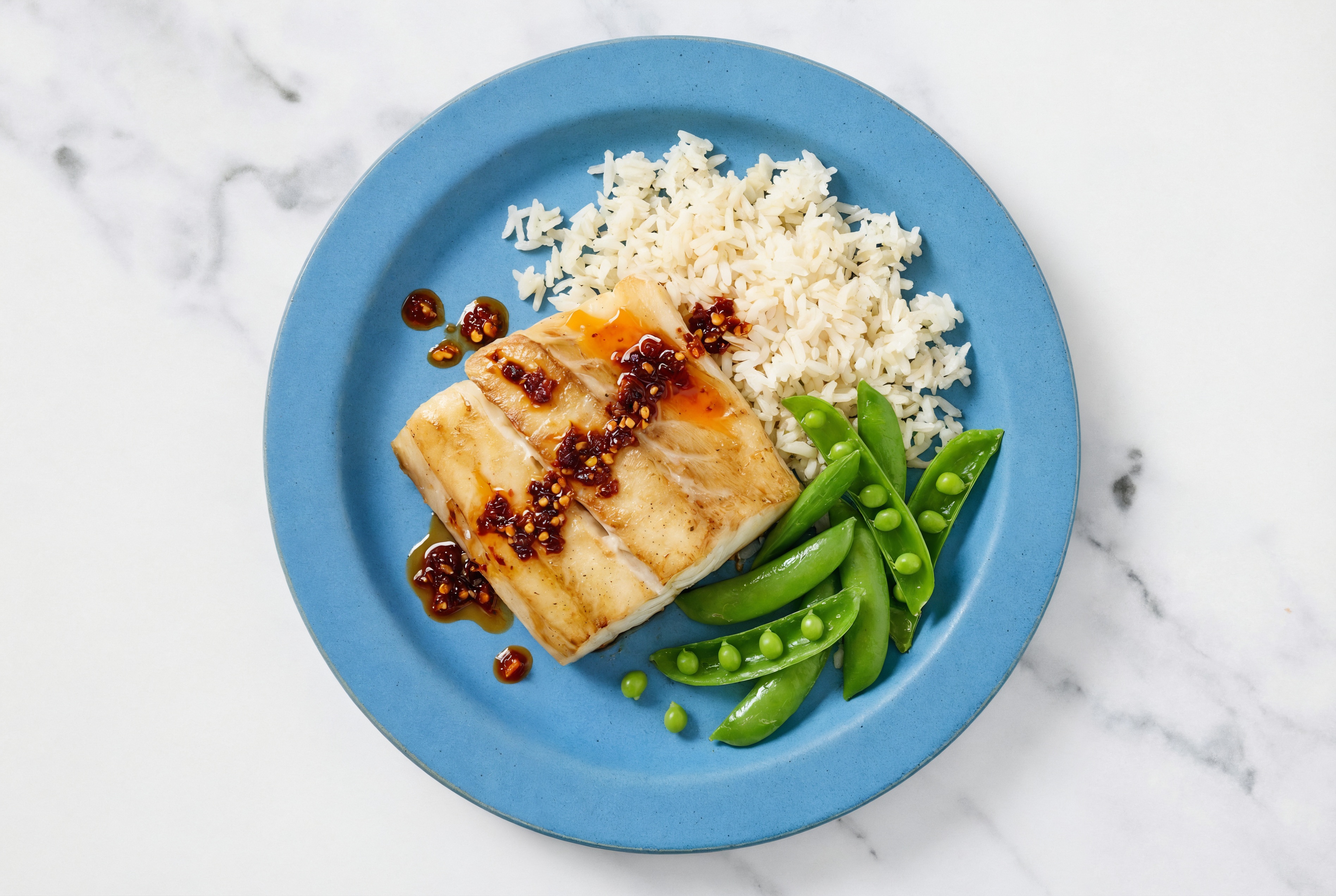 Chili Crisp Barramundi Long Grain White Rice Bowl