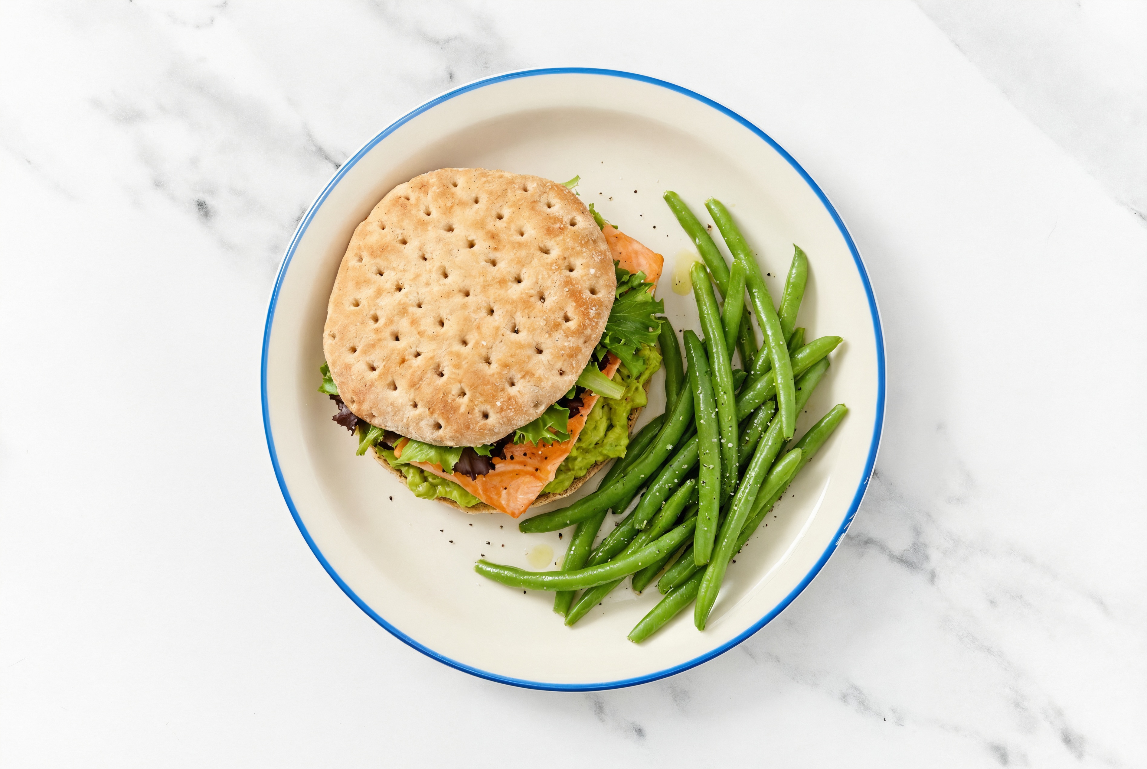 Guac' Salmon Sandwich on Multigrain with Spring Mix + Green Beans