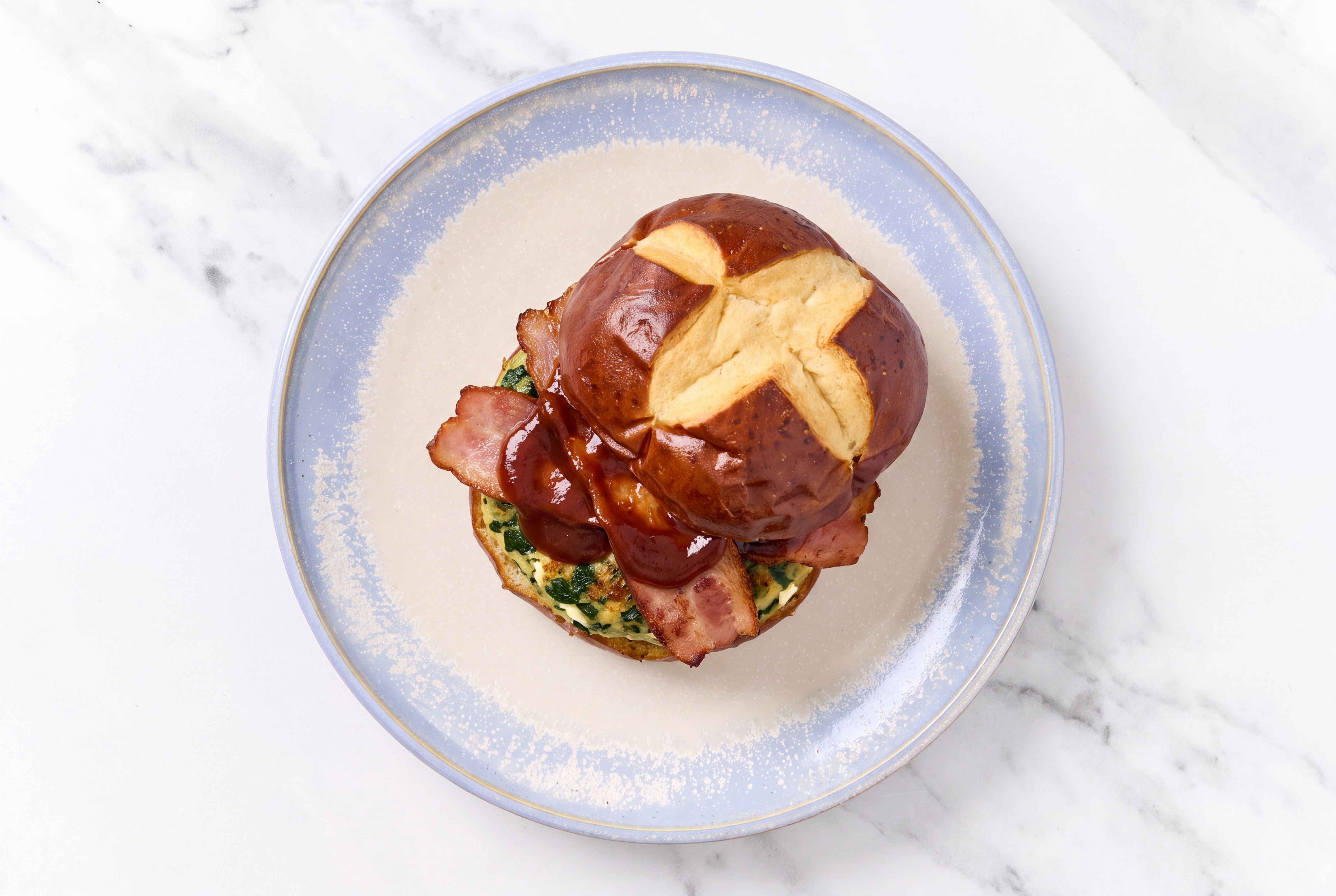 Garlic Turkey Burger on Pretzel with BBQ & Turkey Bacon