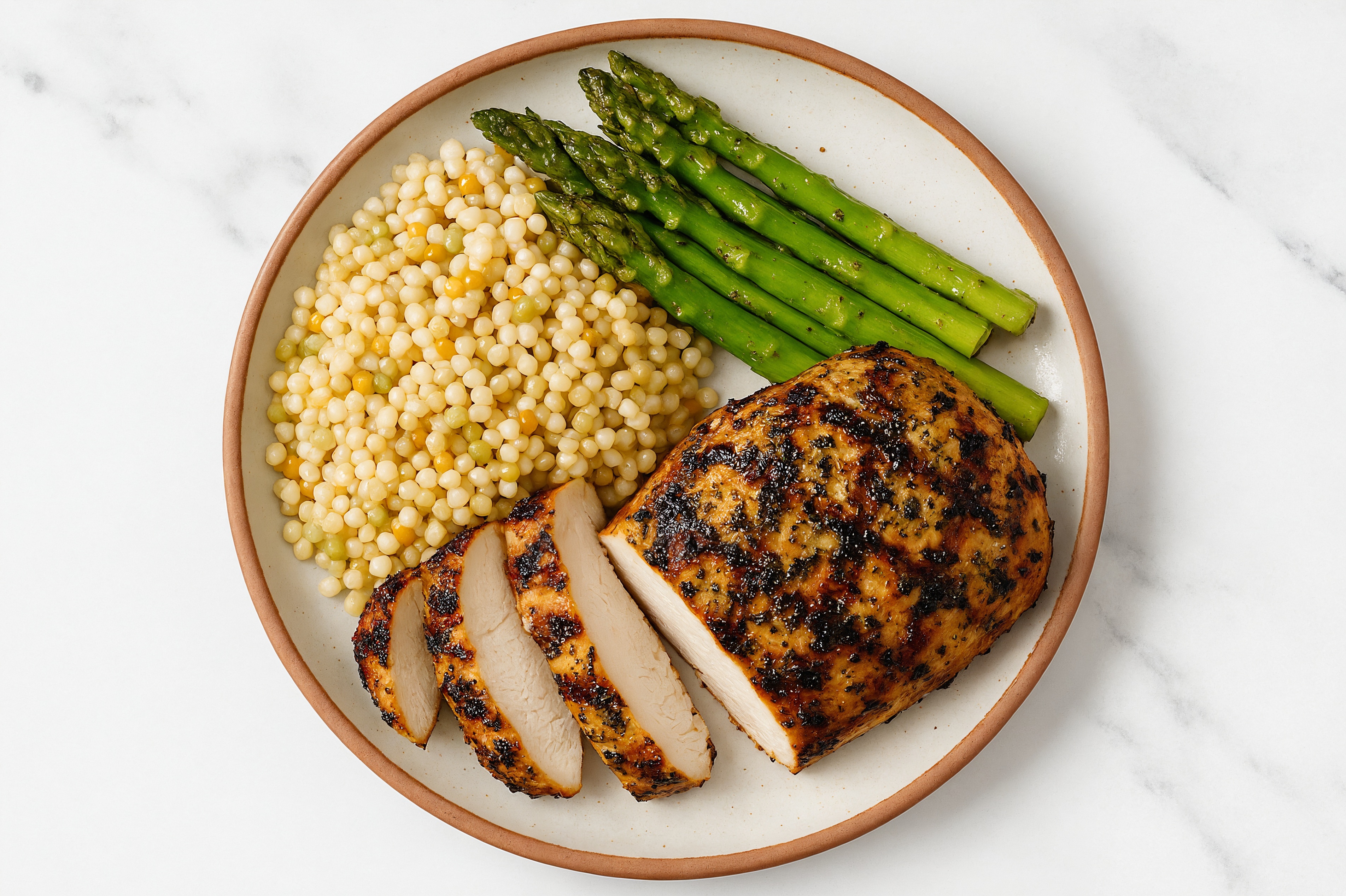 Herby Grilled Mediterranean Chicken Breast + Asparagus with Couscous