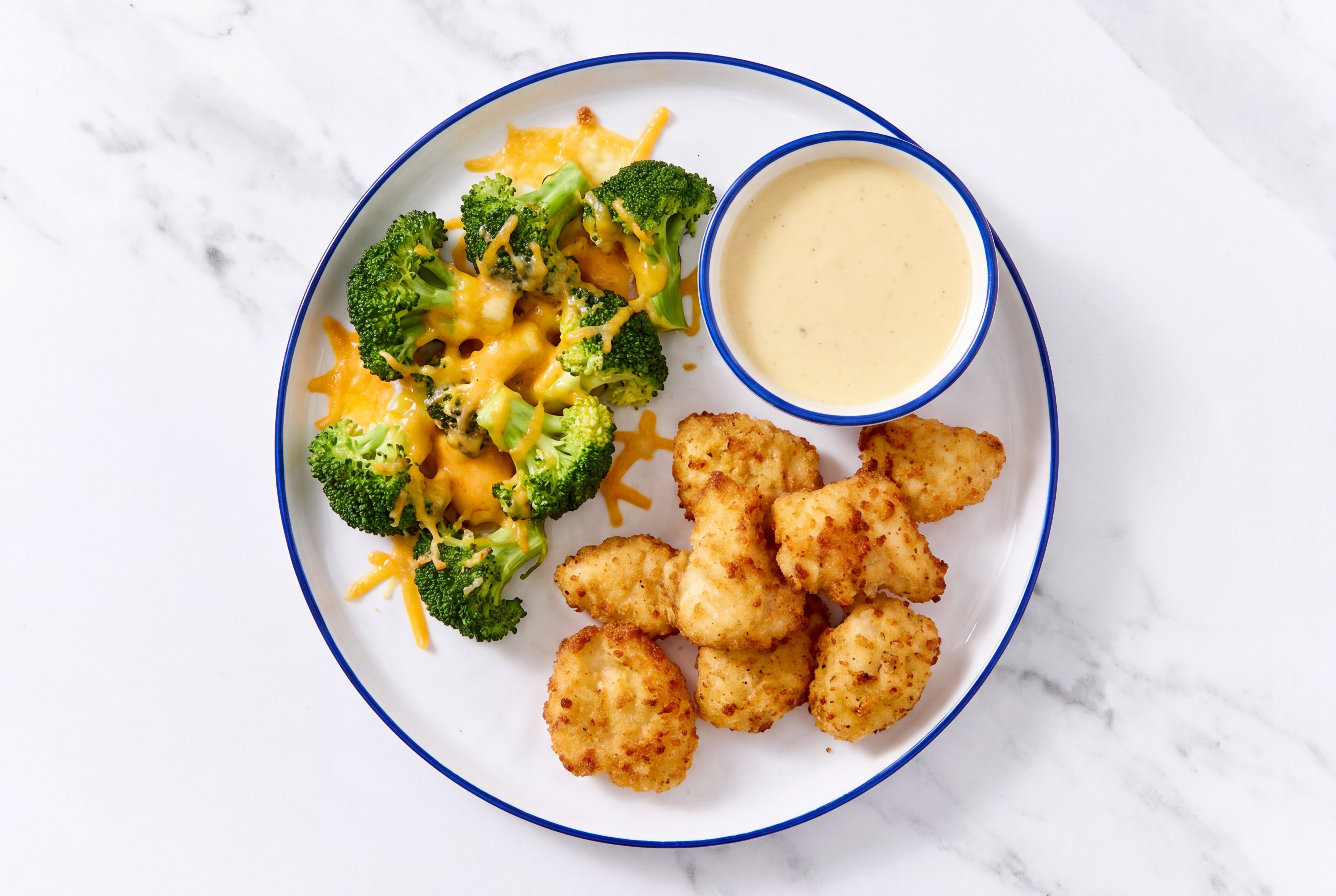 Chicken Nuggets + Cheesy Organic Broccoli with Miso Caesar