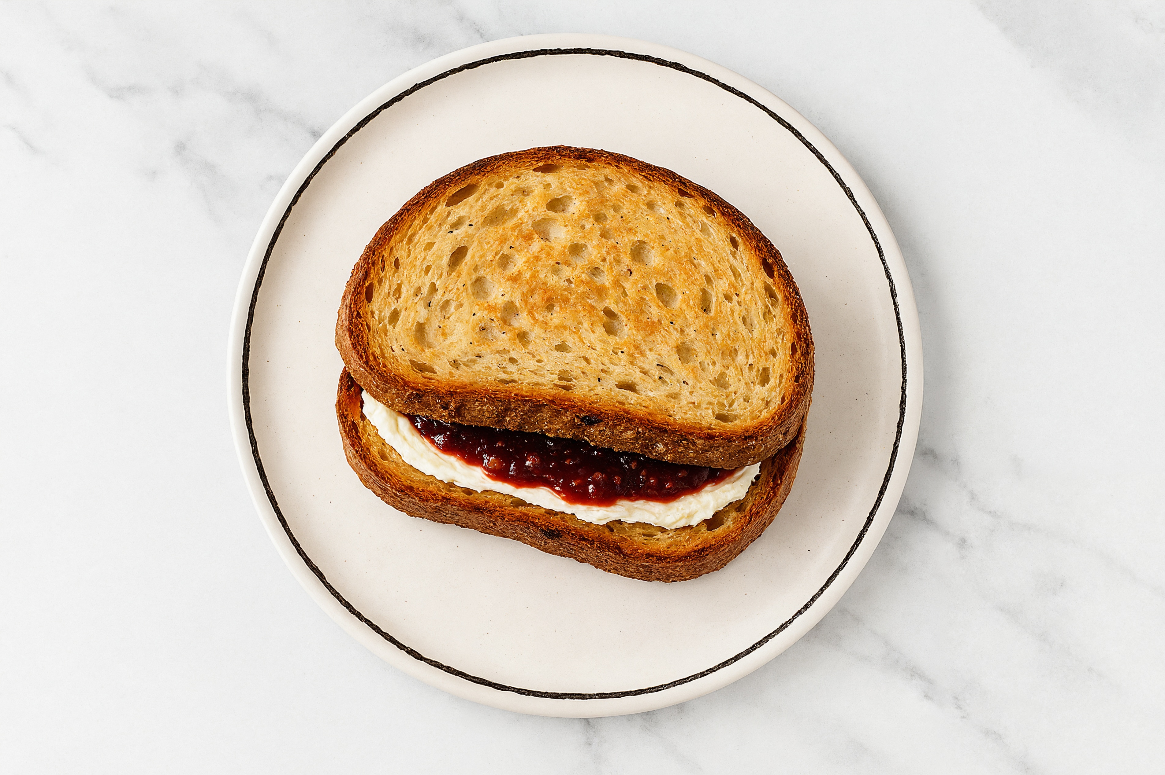 Cream Cheese + Strawberry Jam Multgrain Sourdough Sandwich
