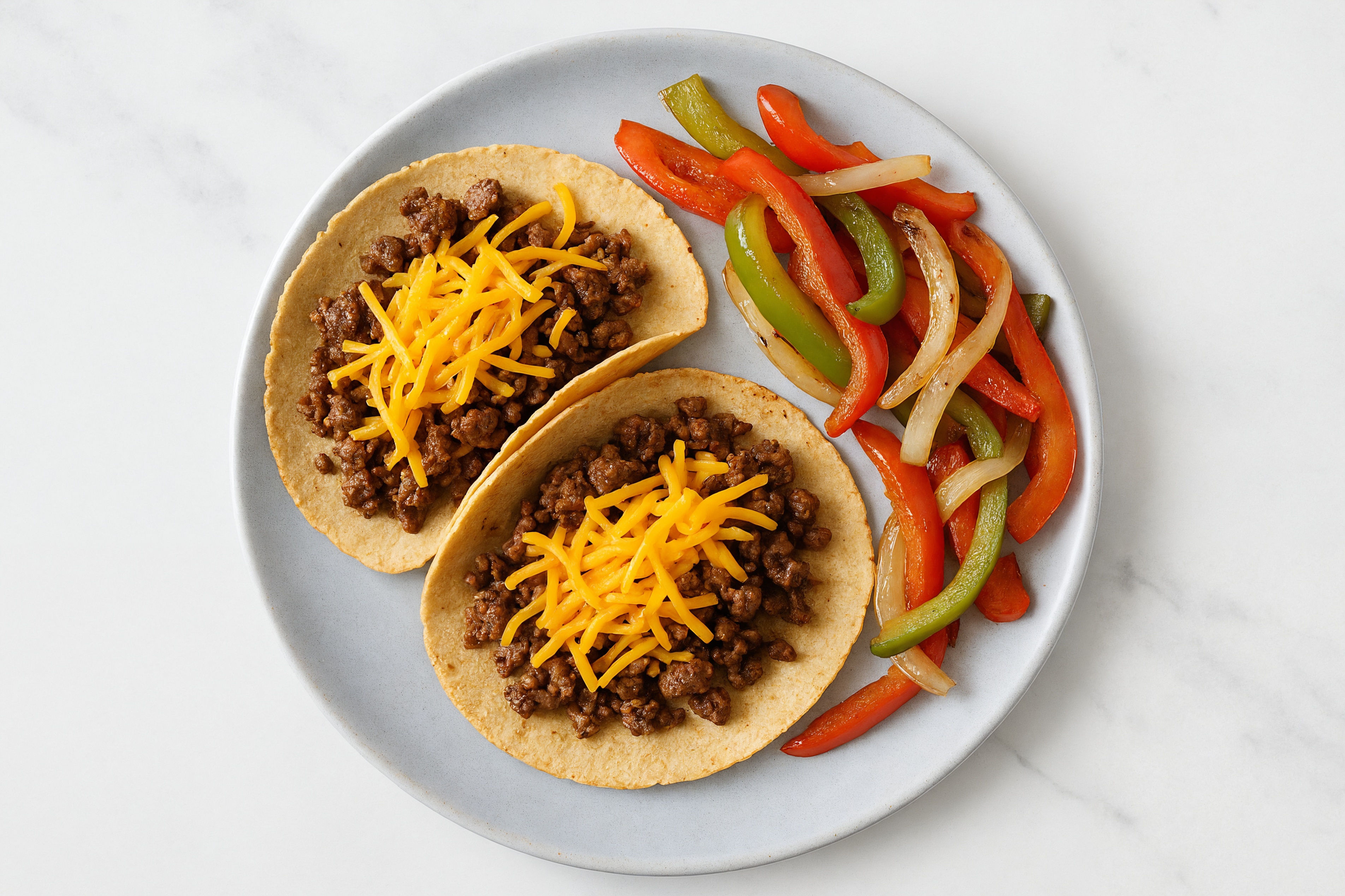 Rustic Cheesy Ground Beef Tacos + Fajita Veggies with Shredded Sharp Cheddar Cheese
