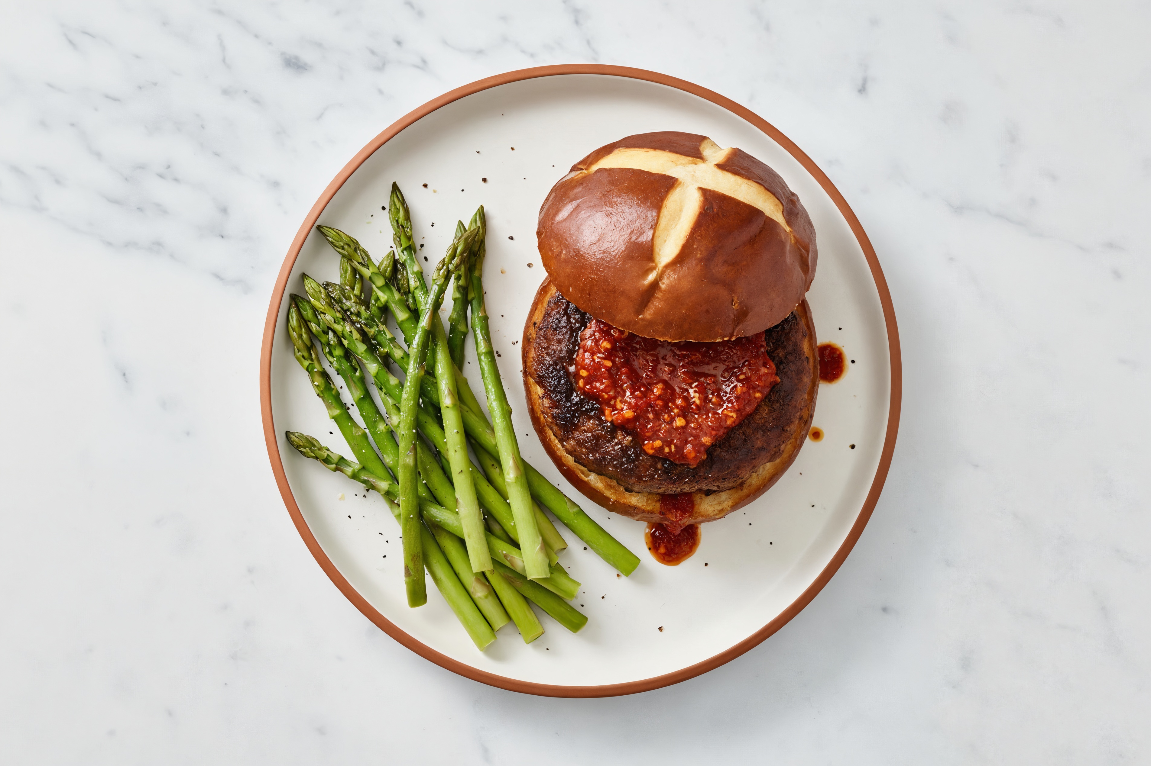 Chili Crisp Beyond Burger on Pretzel Bun