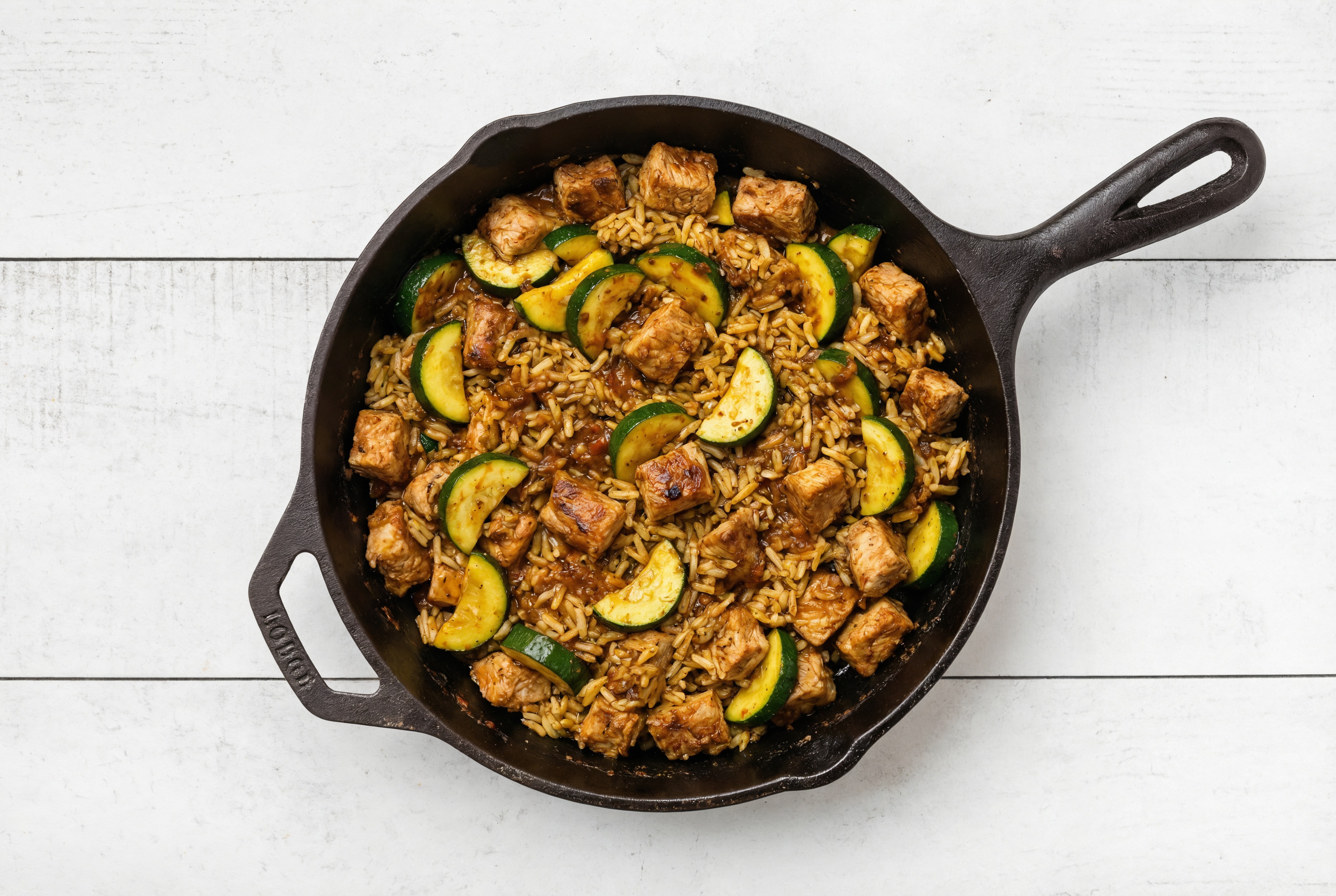 Spicy Vindaloo Pork Chop Stir-Fry with Zucchini over Jasmine Rice