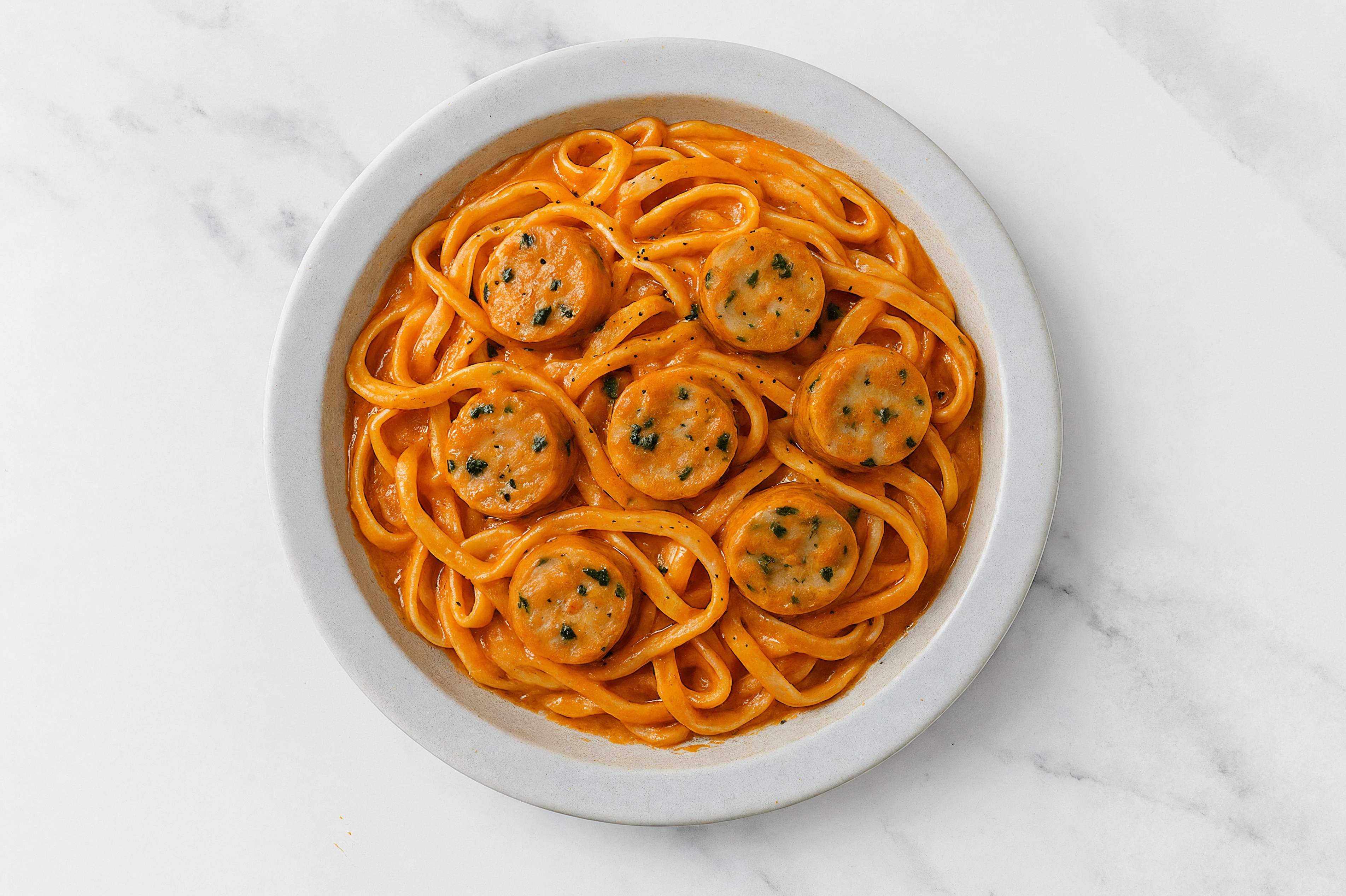 Vodka Sauce Egg Pasta with Garlicky Chicken Sausage with Cauliflower Linguine