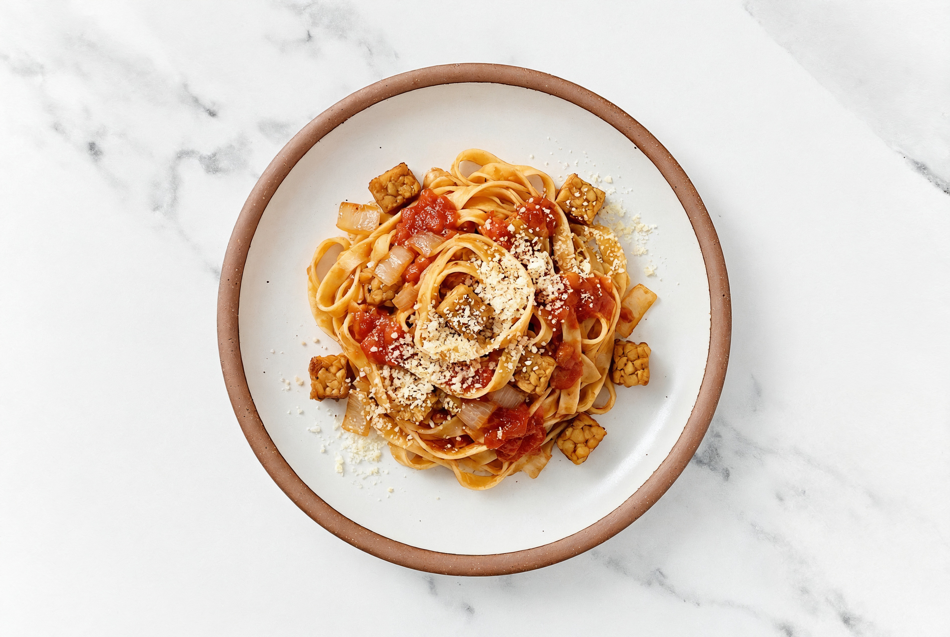 Cheesy Tempeh Tagliatelle Bolognese