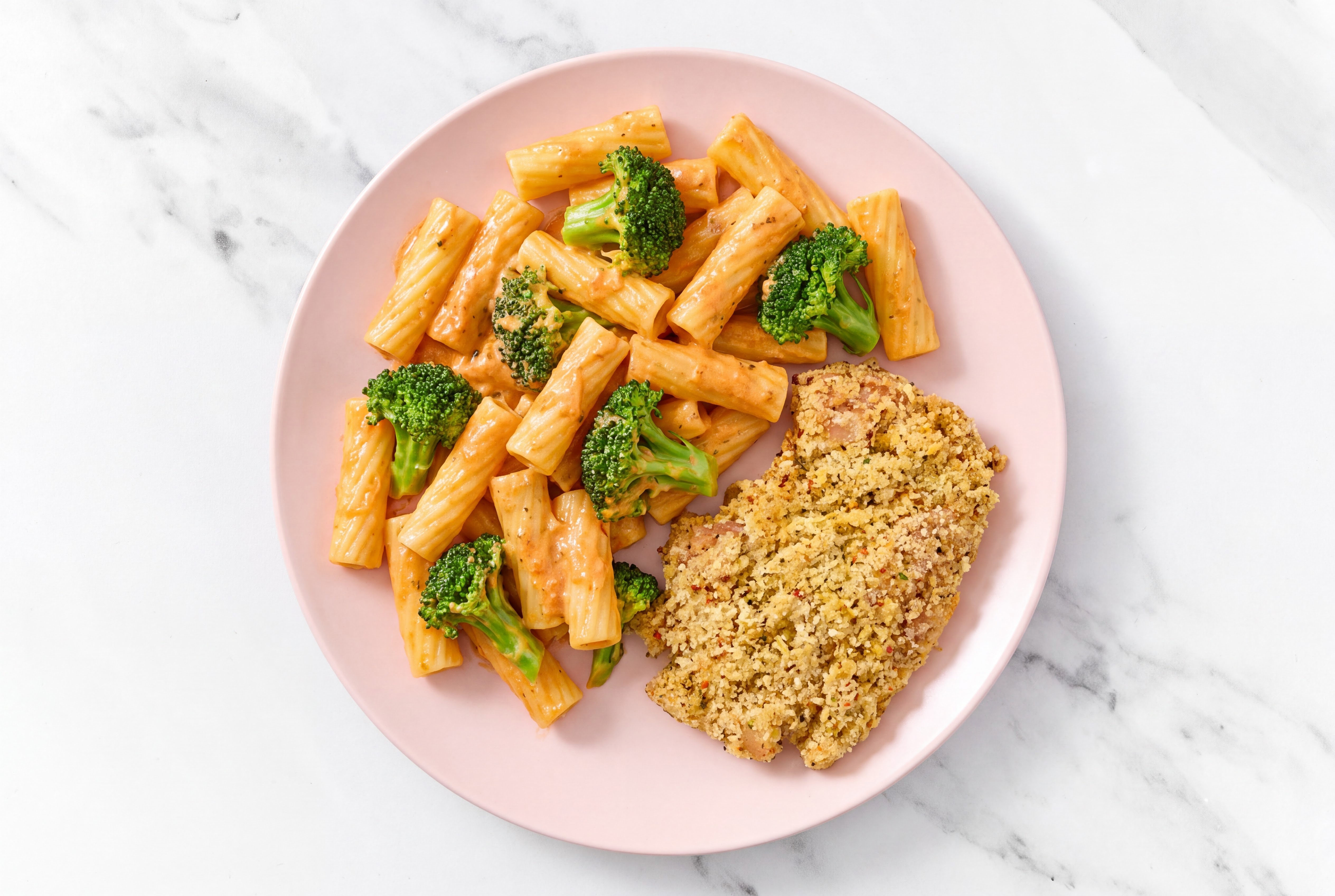 Crispy Garlic Chicken over Creamy Vodka Rigatoni with Broccoli