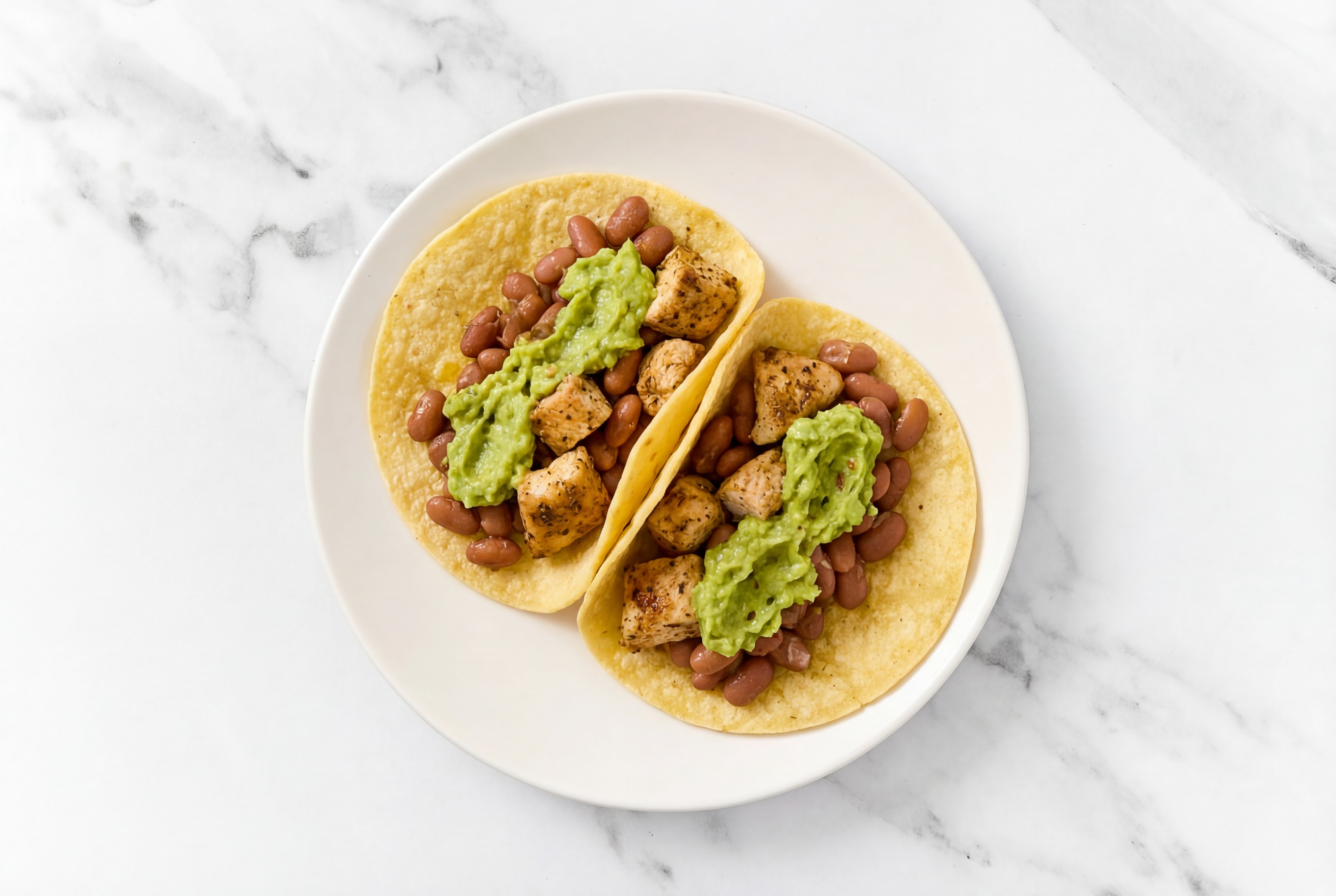 Herby Garlic Chicken Tacos with Guacamole & Pinto Beans