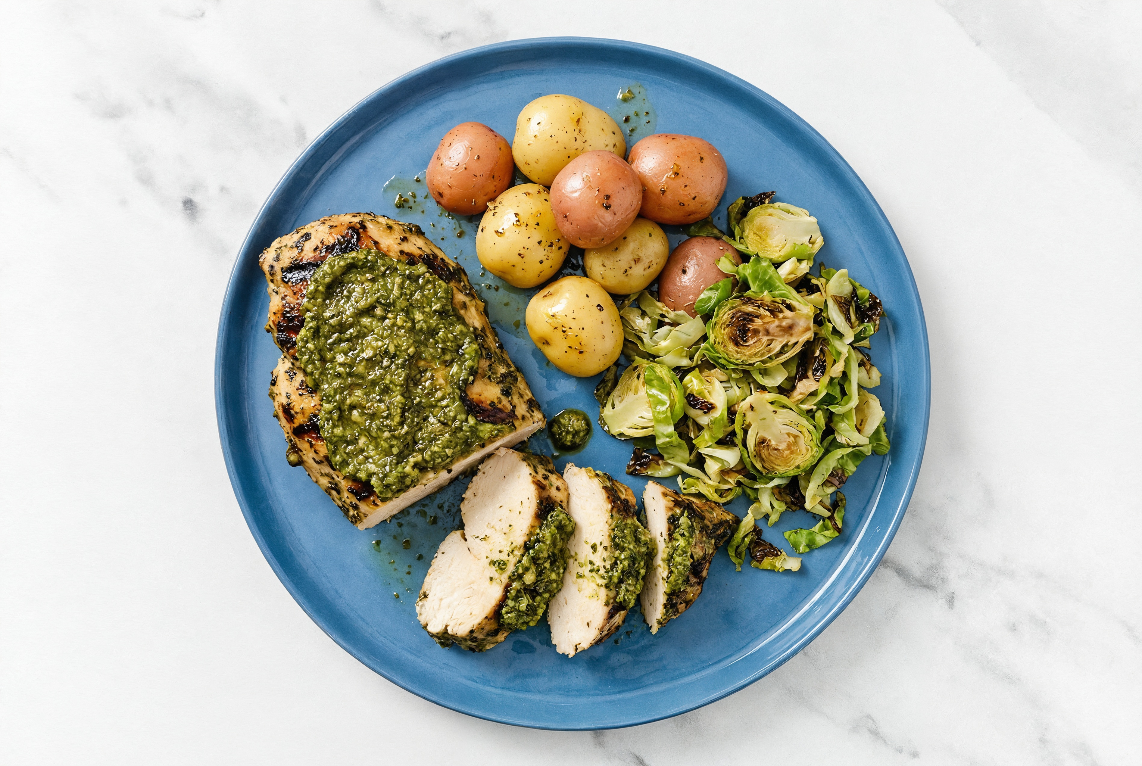 Grilled Pesto Mediterranean Chicken with Crispy Brussels