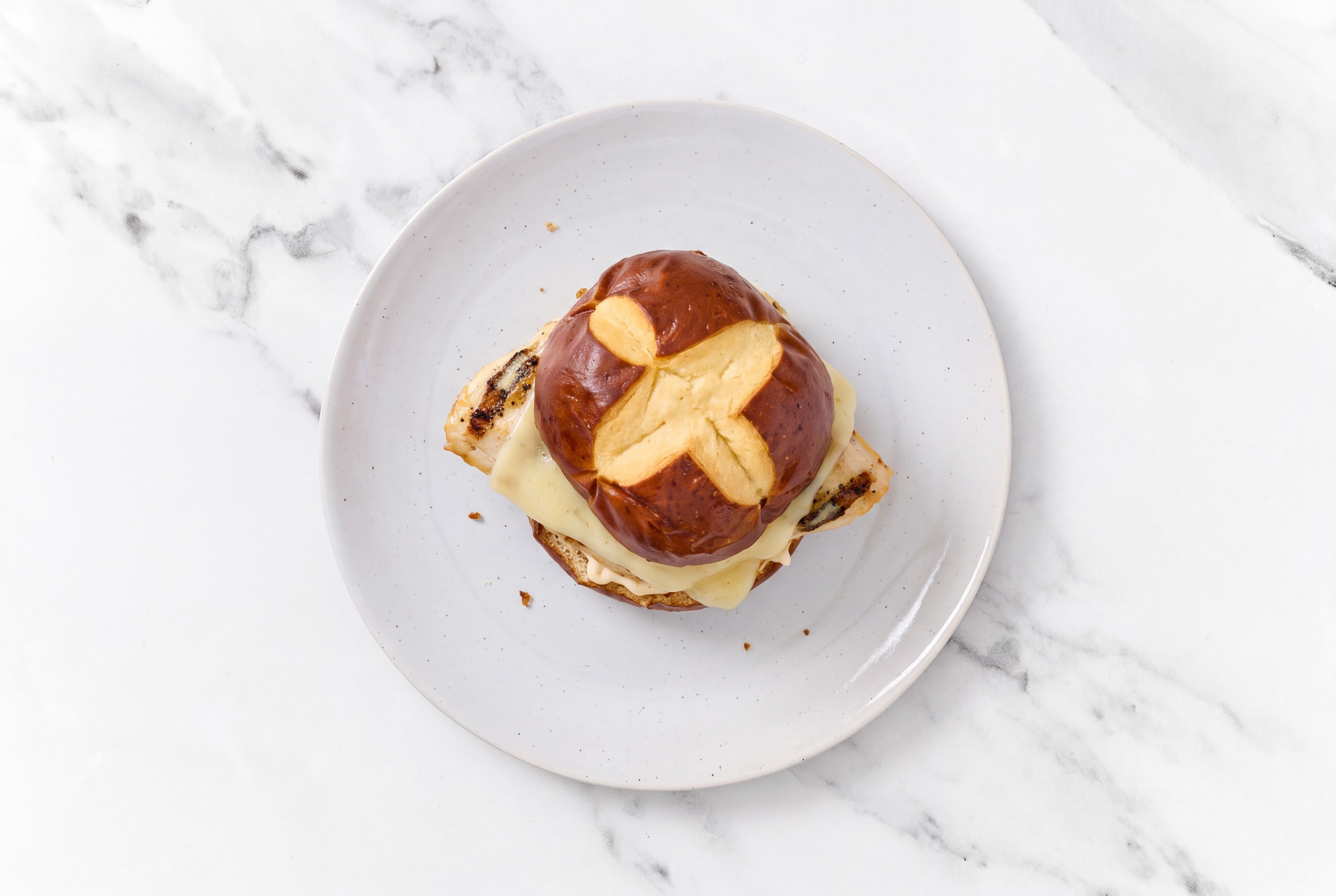 Creamy Horseradish Seasoned Grilled Chicken Breast Pretzel Sandwich