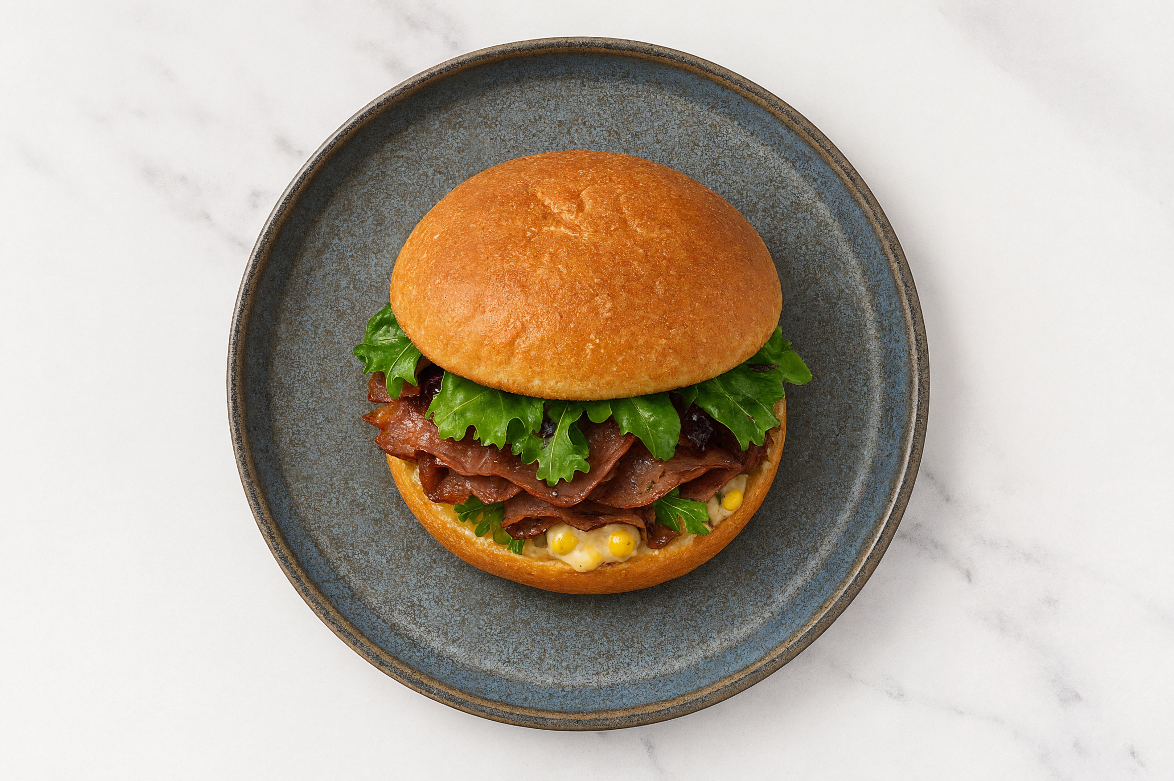 Street Corn Beef Steak Sandwich with Spring Mix on Gluten-Free Buns