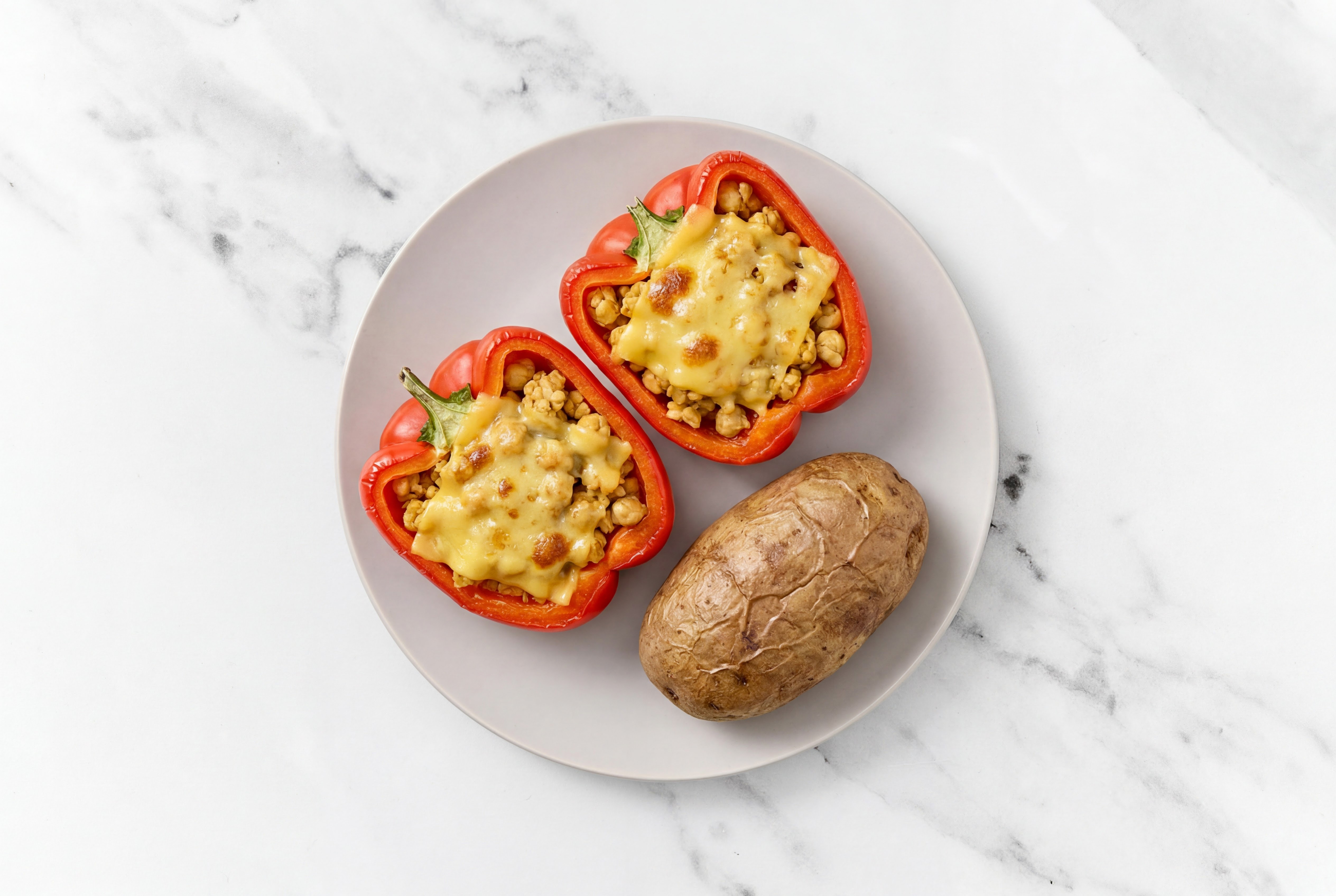 Cheezy Tempeh Stuffed Peppers + Potato