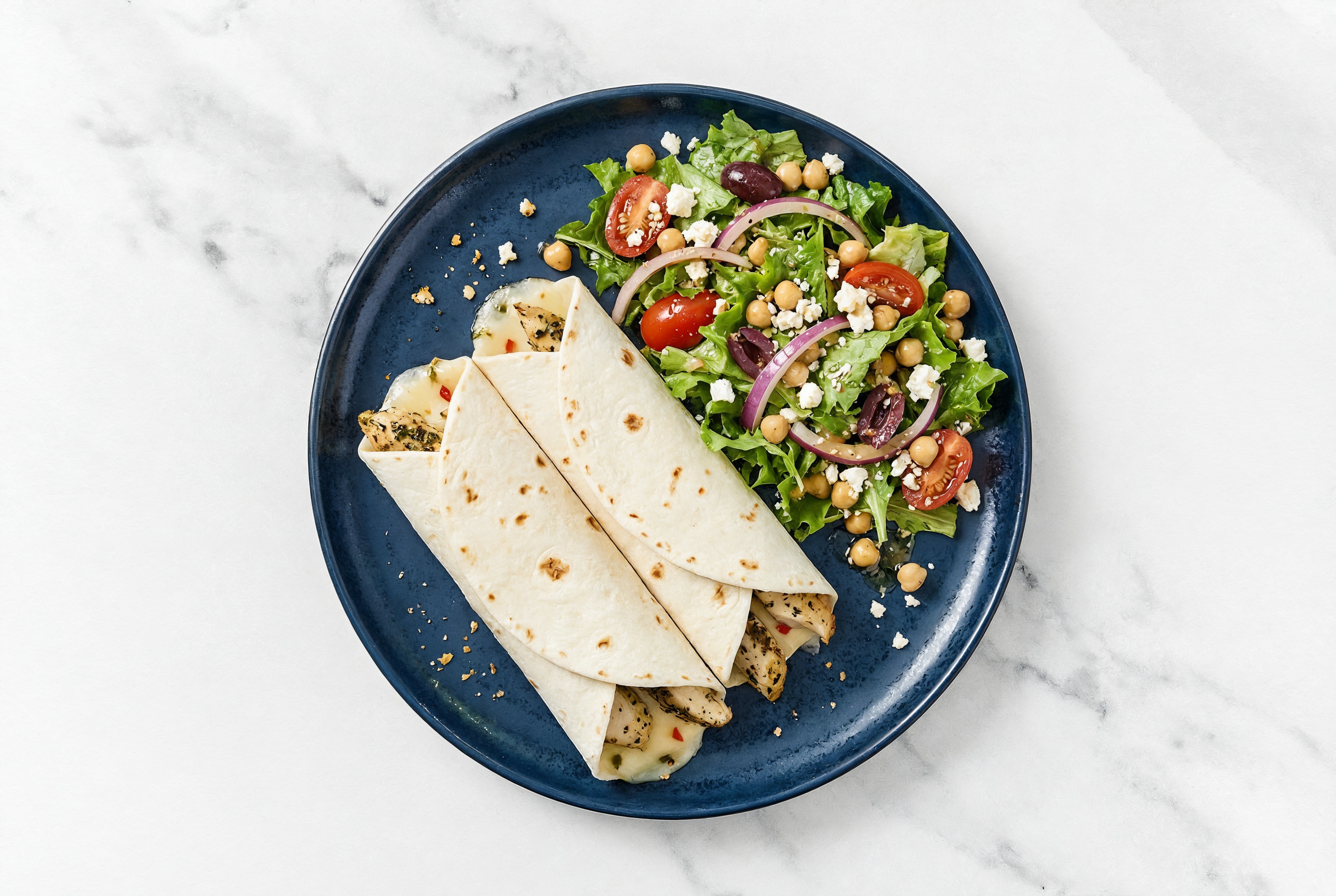 Mediterranean Grilled Chicken Breast + Jack Cheese Wrap with + Side of Greek Salad
