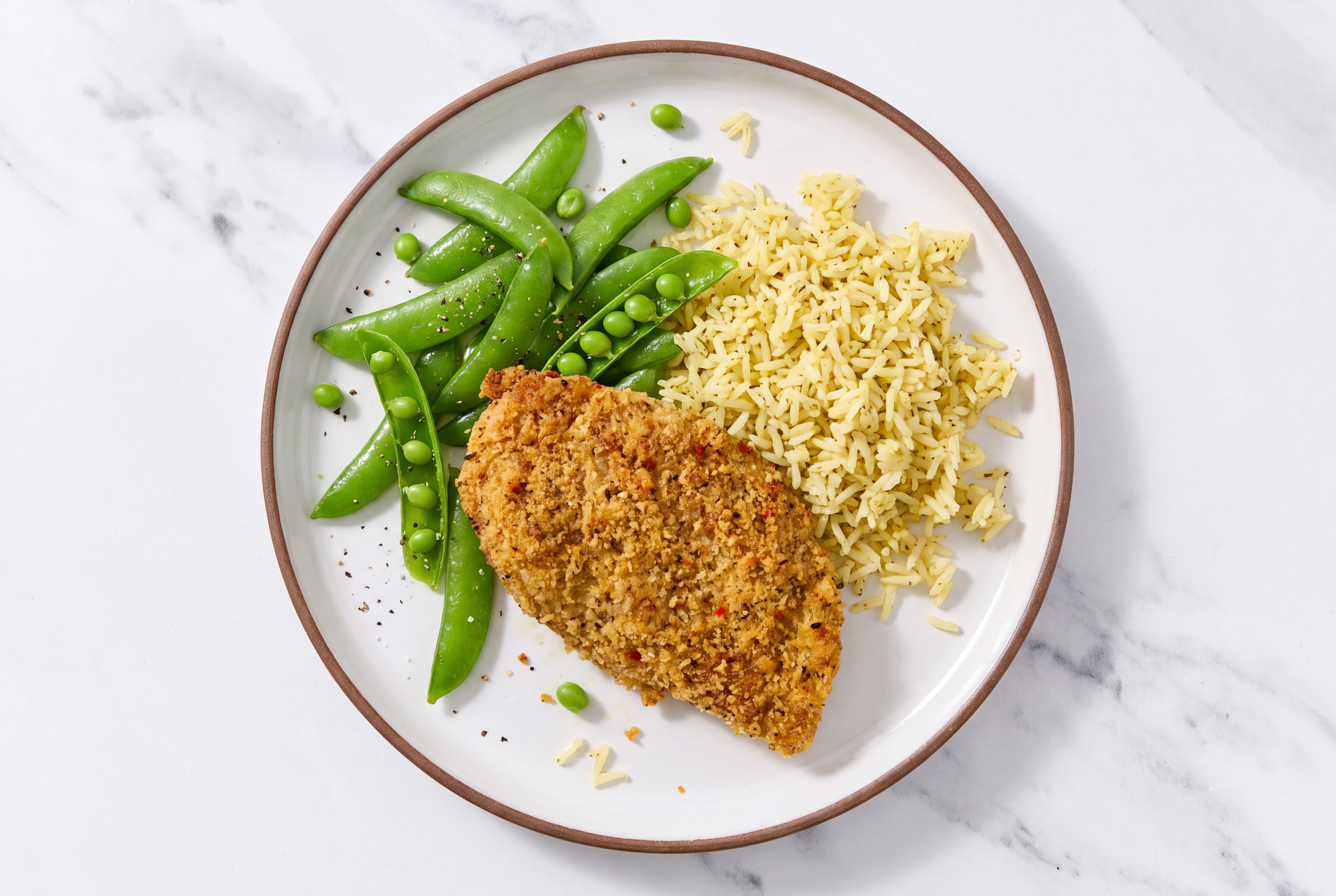 Parmesan Breaded Chicken Cutlet with Snap Peas & Jasmine Rice
