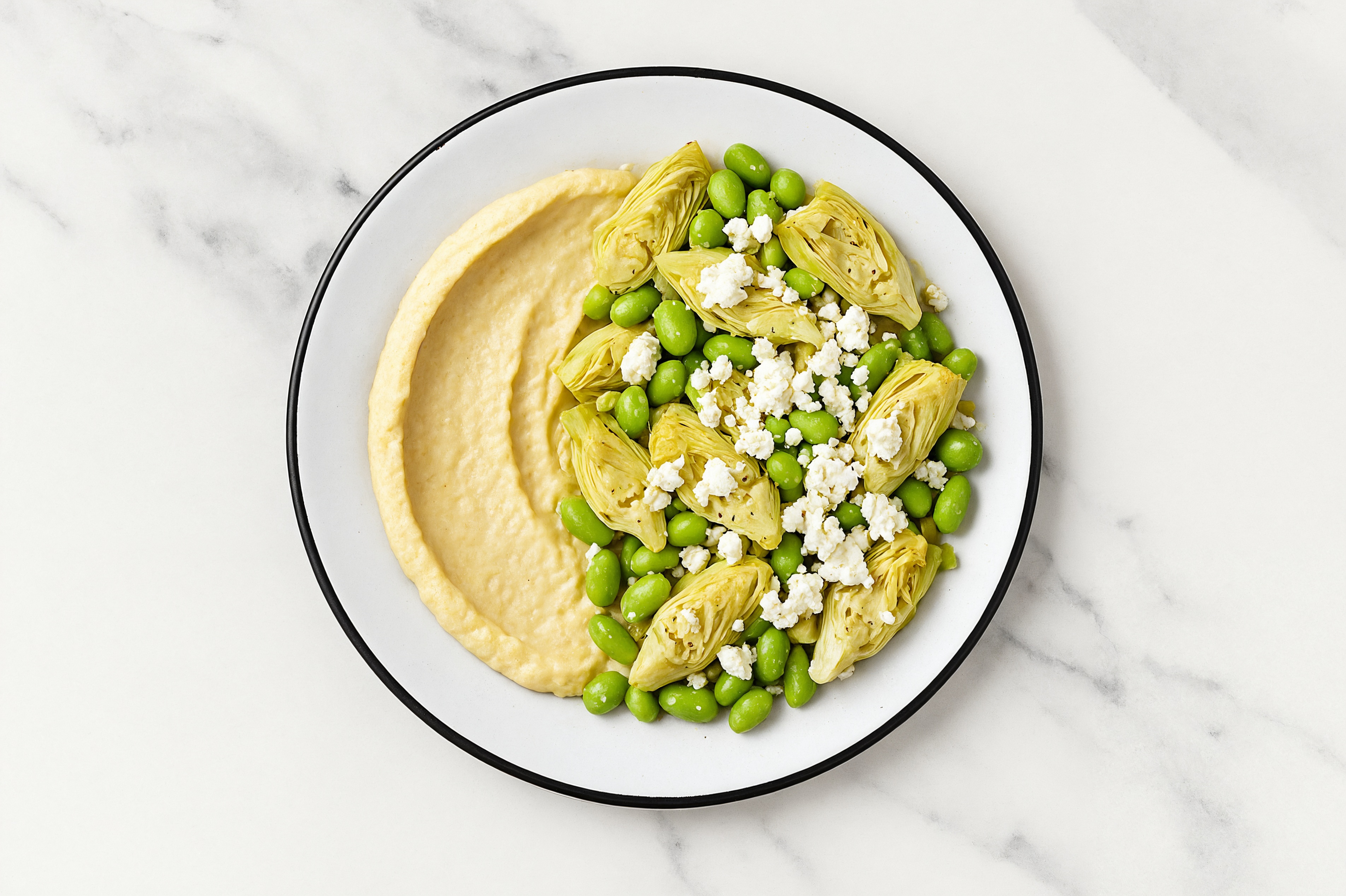 Feta Artichoke Edamame Bowl over Lemon Garlic Hummus