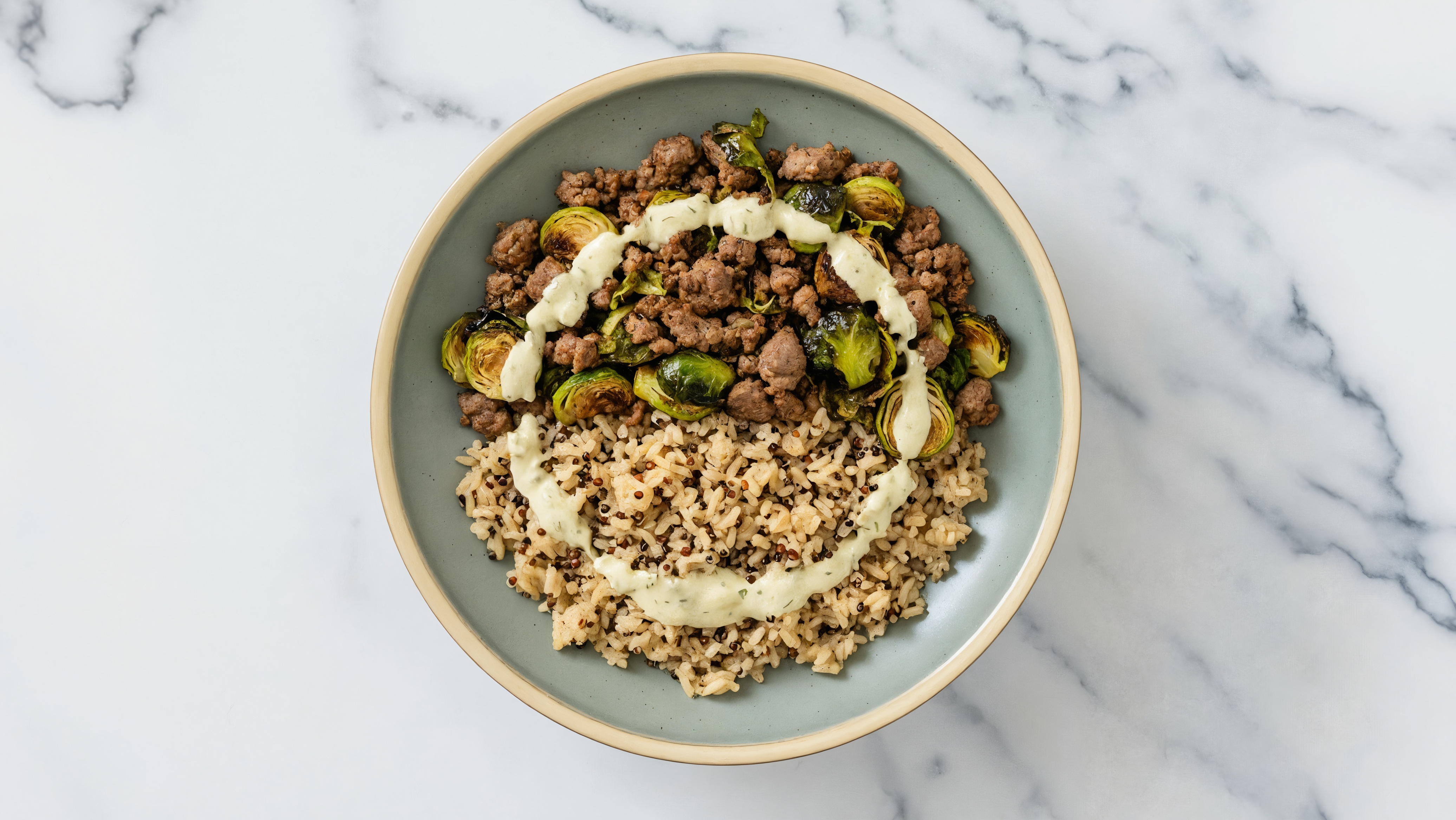 Creamy Herb Ground Lamb + Quinoa Bowl with Shaved Brussels