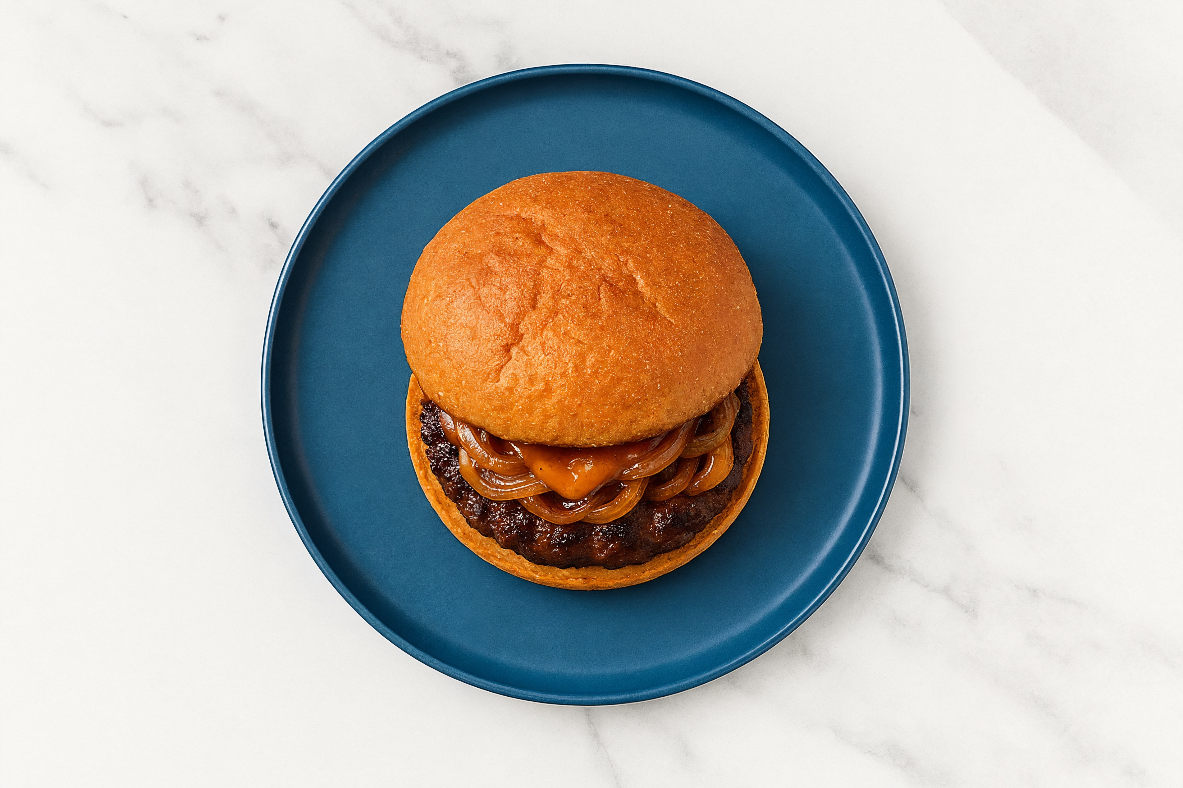 Caramelized Onion Tavern Beef Burger on GF Bun with Smoky BBQ Sauce