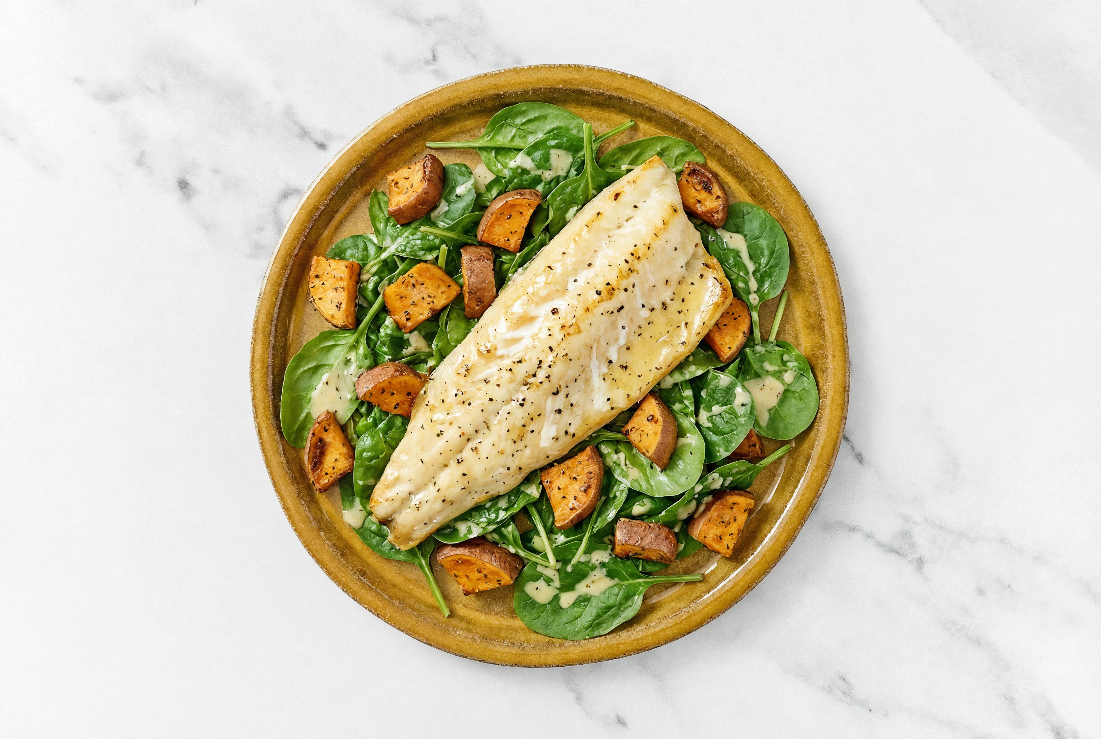 Hearty Roasted Trout Caesar Salad with Baby Spinach