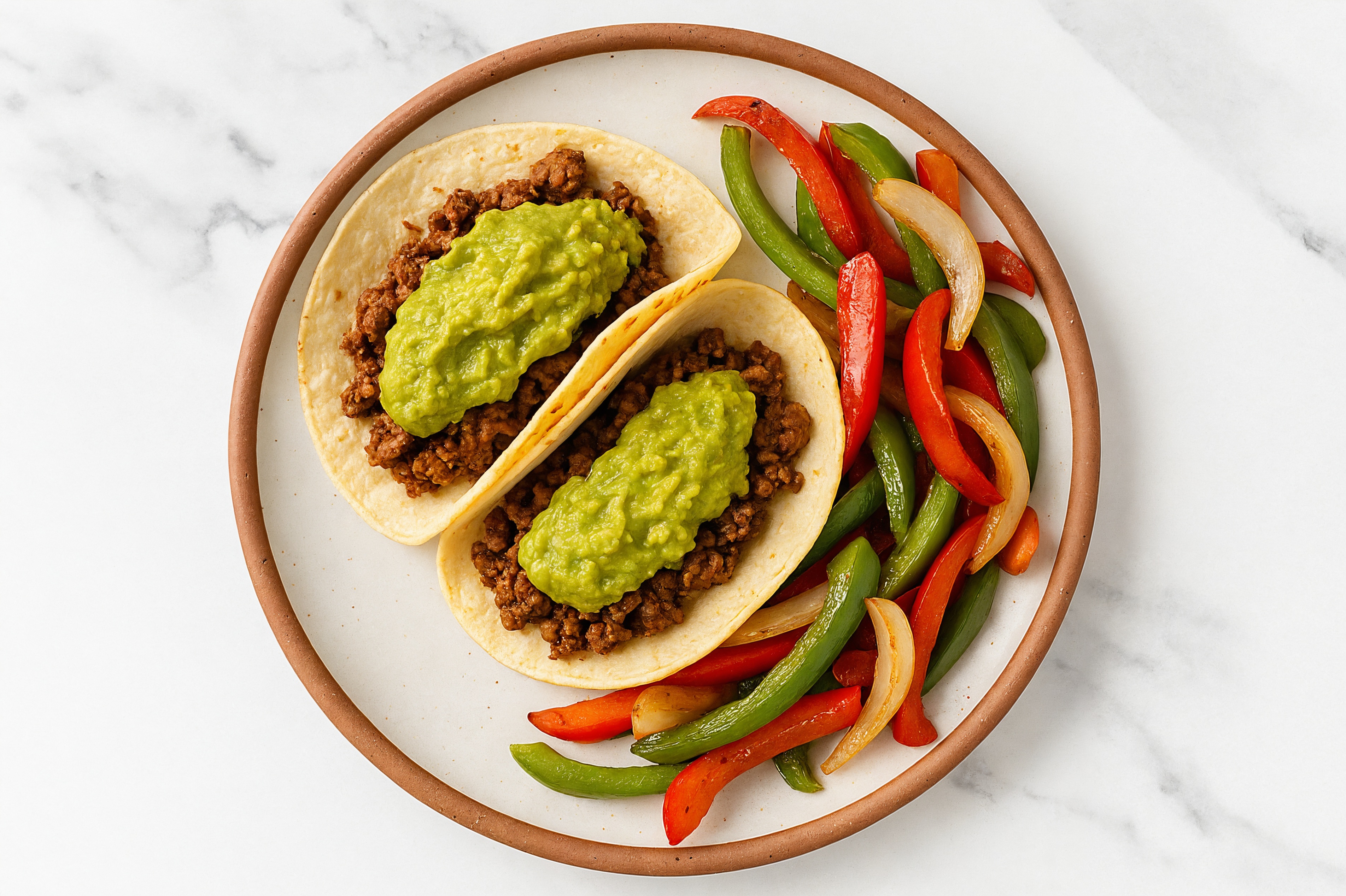 Ground Bison + Guacamole Tacos on Flour White Tortillas