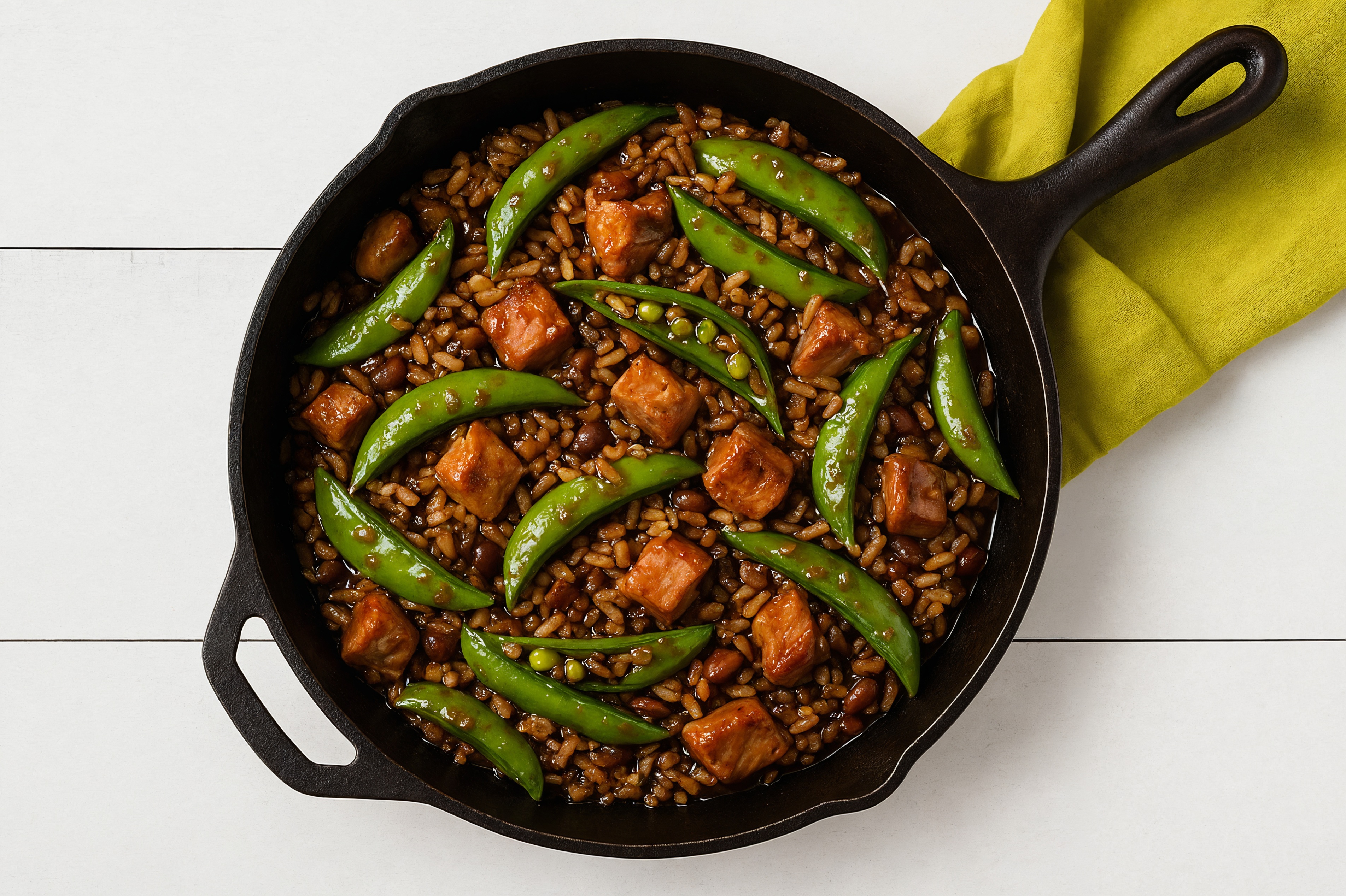 Teriyaki Pork Chop Stir-Fry with Snap Peas over Quinoa